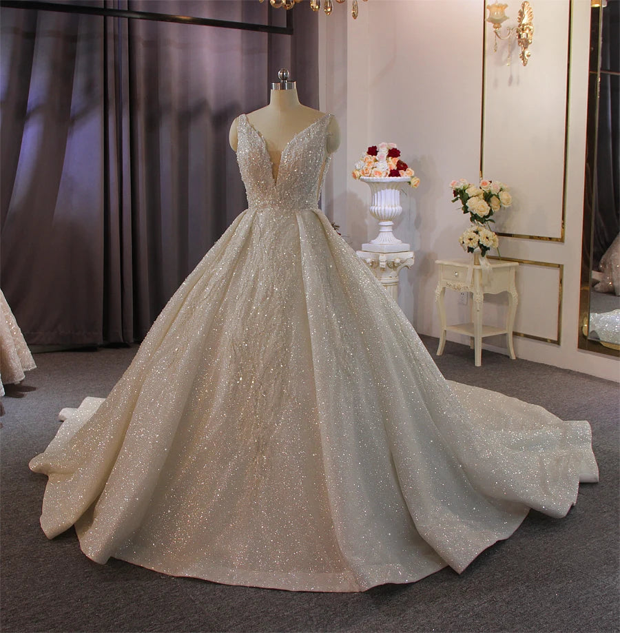 Elegant Sleeveless Ball Gown Wedding Dress with Shimmering Fabric - Perfect for Bridal, Prom & Formal Events