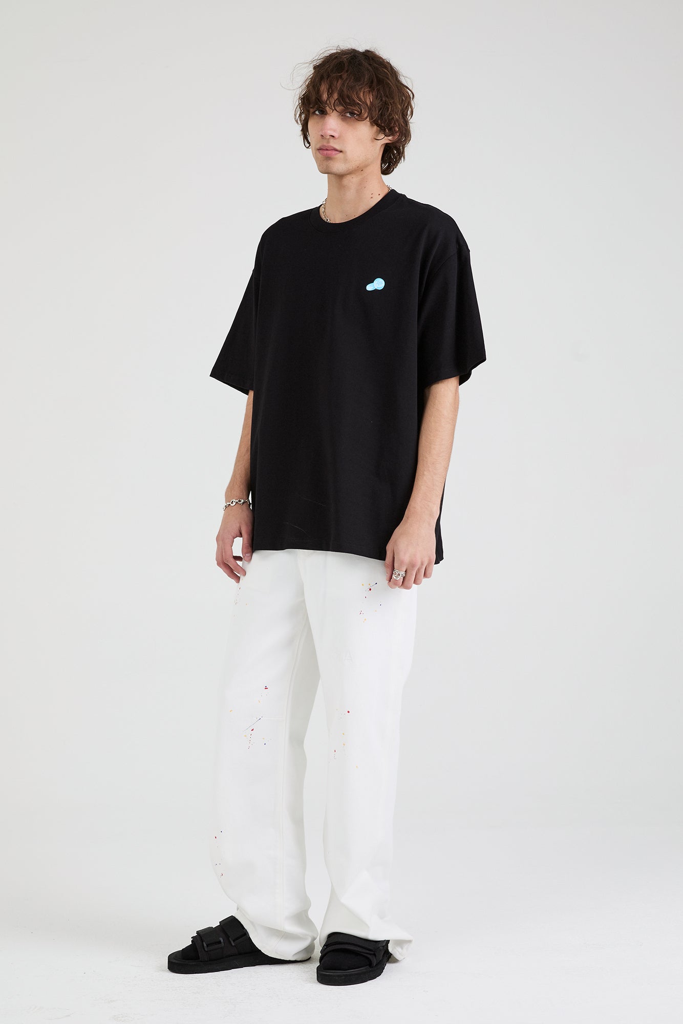 COLIN Oversized Short Sleeve T-Shirt | Black Contraband Graphic Tee for Men | Casual Streetwear & Summer Outfits