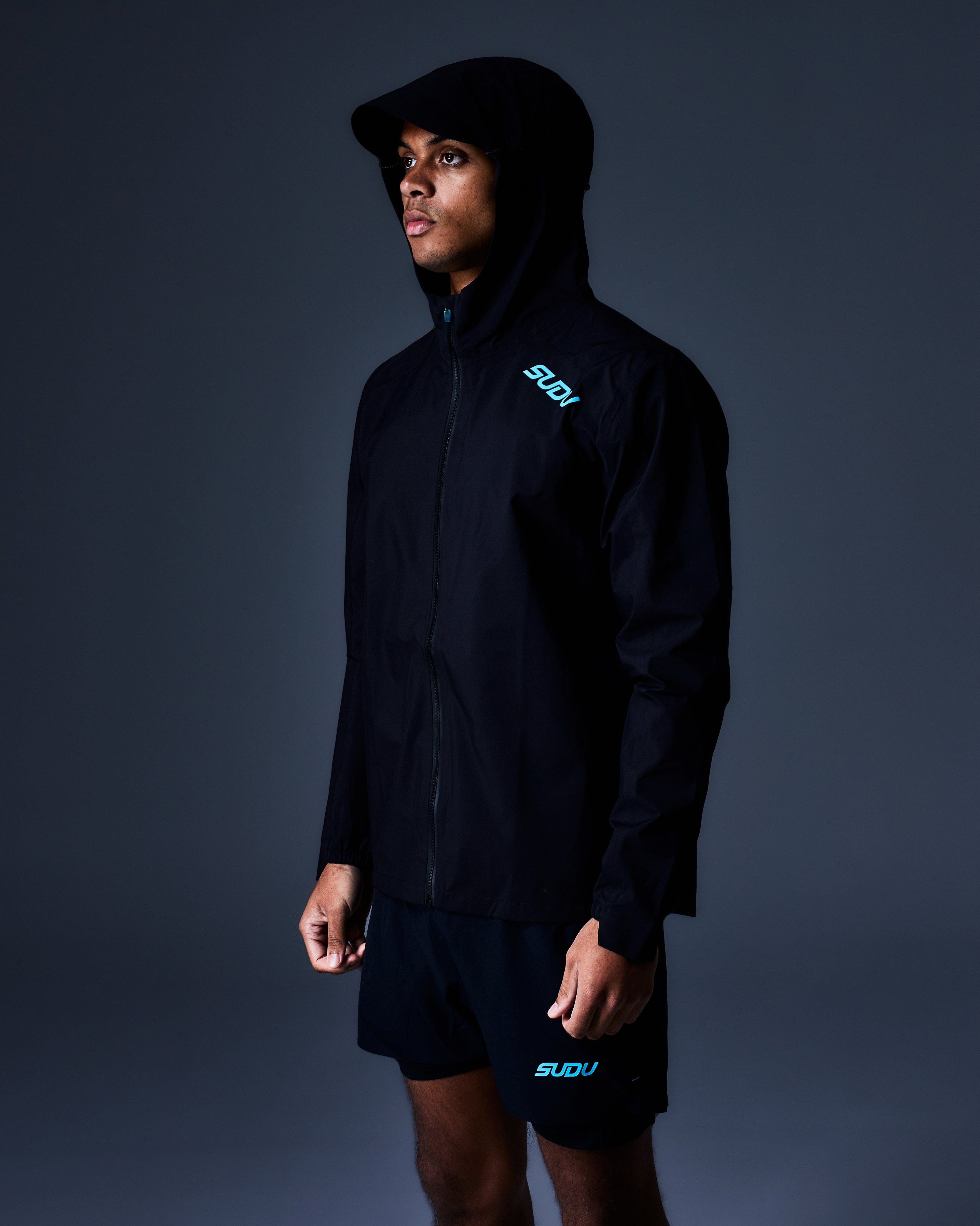 SWP 01 Waterproof Rain Jacket for Men & Women - Lightweight Windbreaker with Hood - Outdoor Hiking, Camping & Travel Essentials - Black