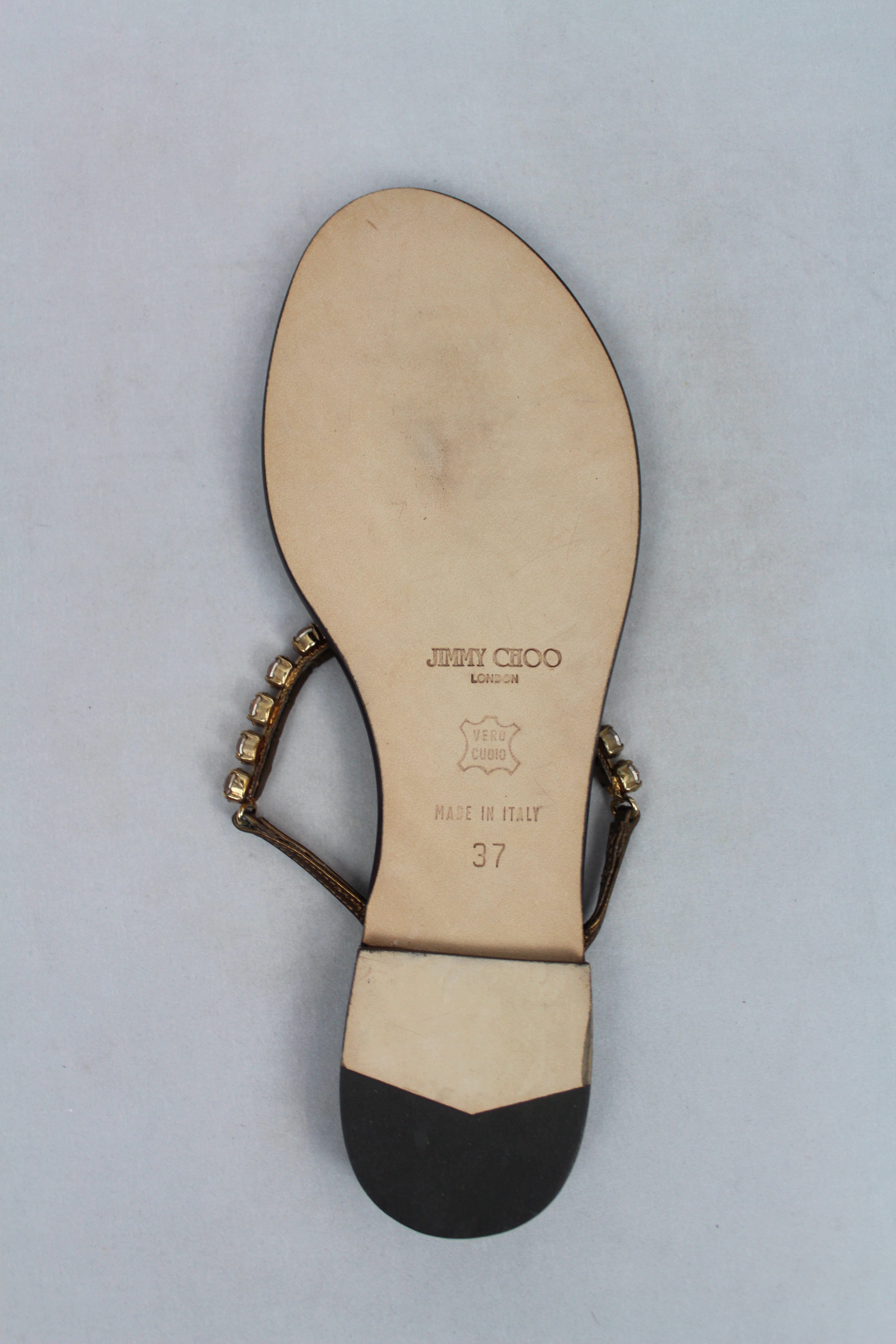 Jimmy Choo Bronze Flip Flops with Stones and Rhinestones - Size 37 | Elegant Summer Sandals for Beach, Pool, and Casual Outings