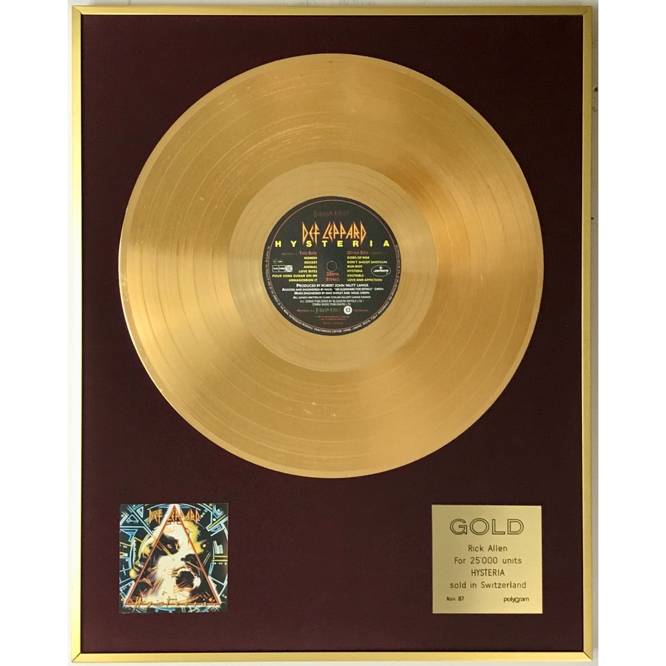 Def Leppard Hysteria Swiss Gold Award Presented to Rick Allen - Rare Collectible Music Memorabilia for Fans & Display in Home, Office, or Music Room