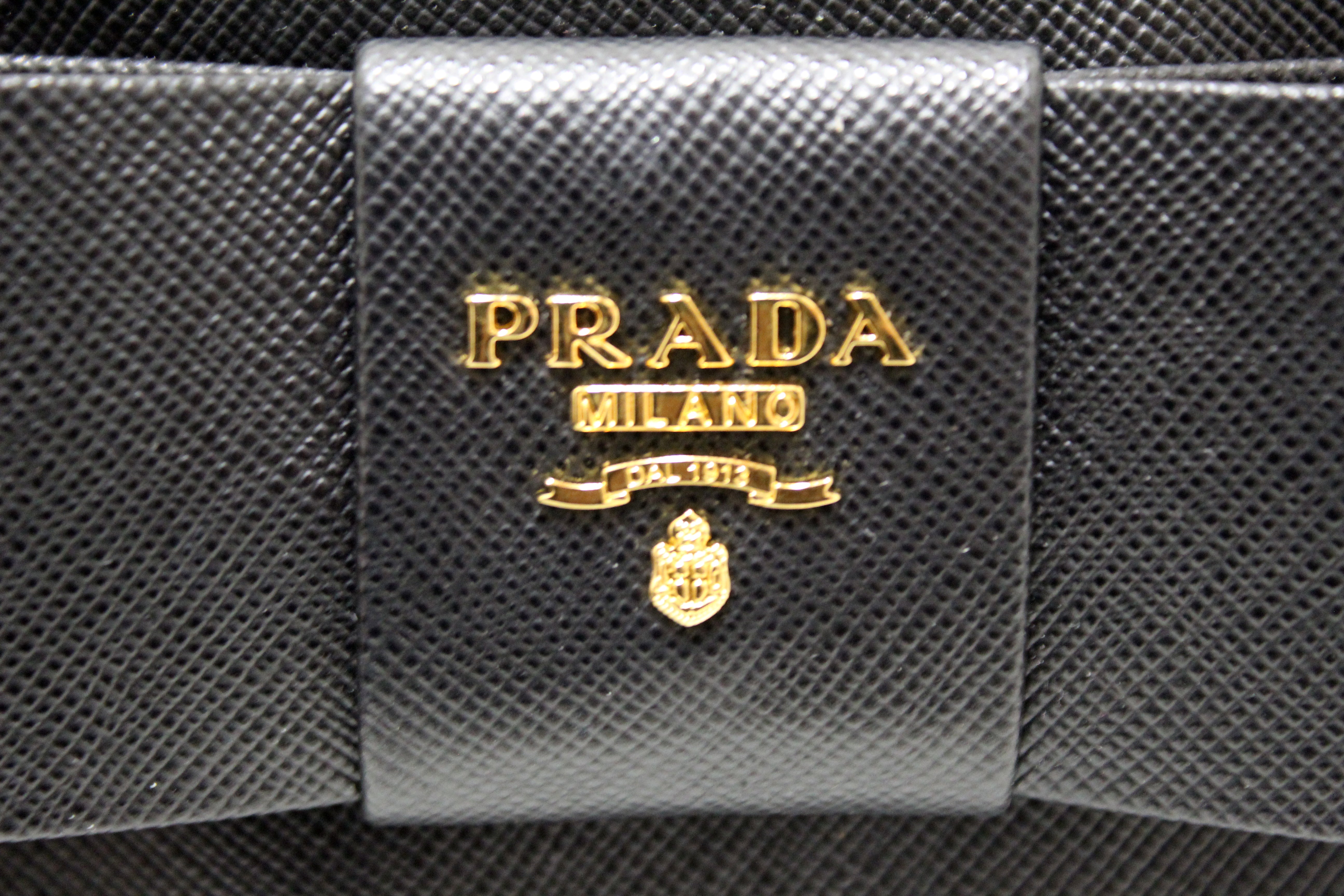 Authentic Prada Black Saffiano Leather Bow Wristlet Pouch - Luxury Small Handbag for Women, Perfect for Parties, Weddings & Evening Events