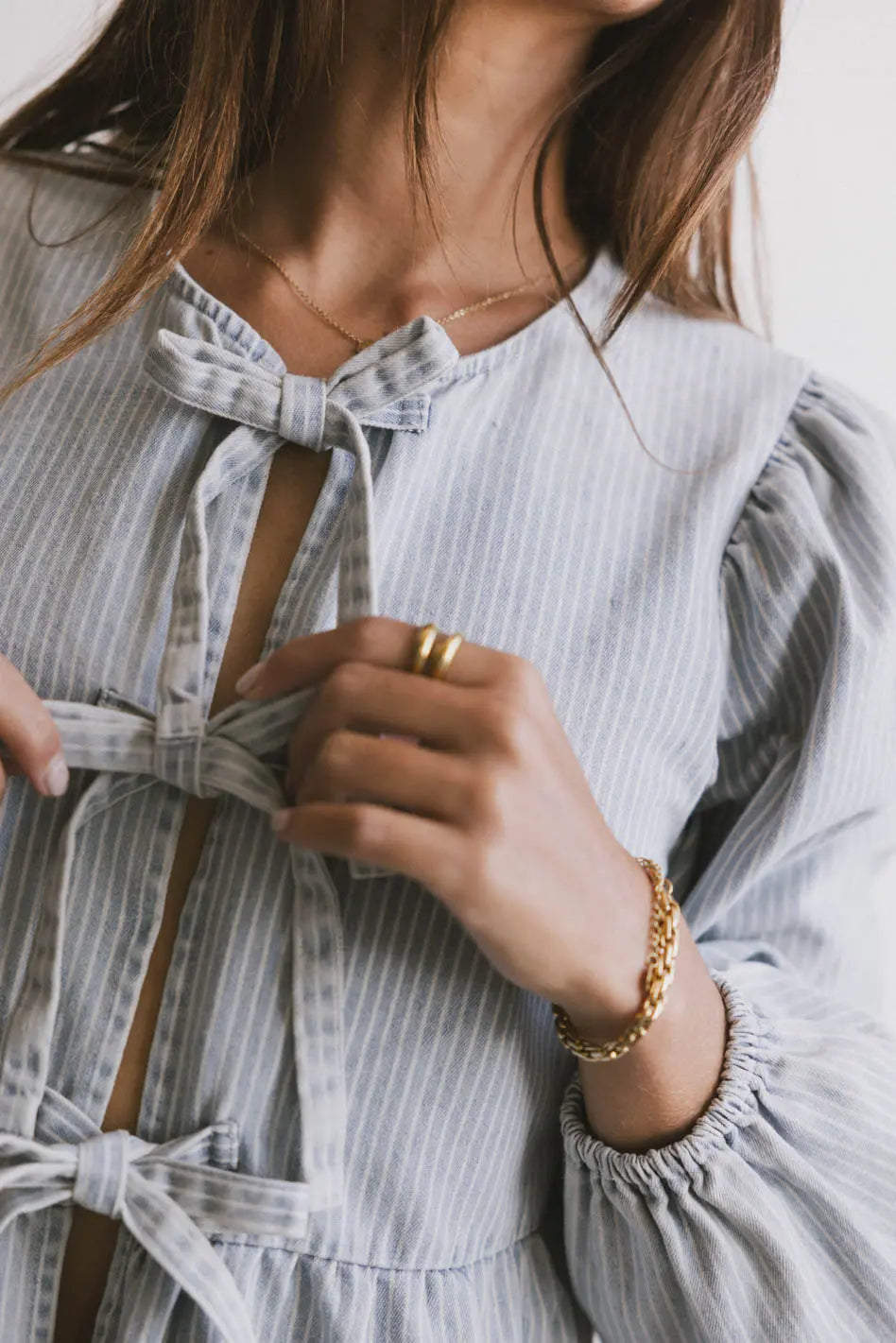 Elegant Maggie Peplum Tie Blouse in Light Wash - Women's Casual & Office Wear - Perfect for Work, Dates & Special Occasions