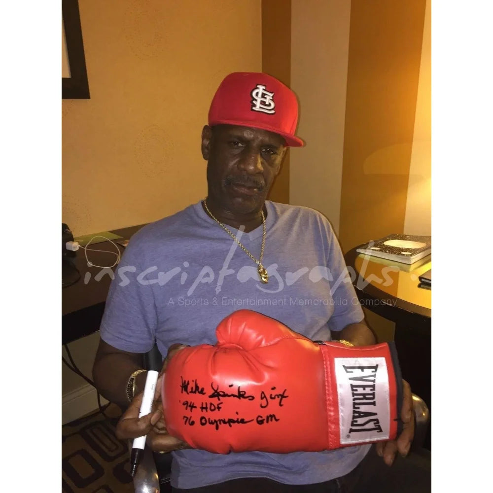 Michael Spinks Autographed Boxing Glove with COA - Signed by Leon - Collectible Memorabilia for Boxing Fans & Sports Enthusiasts - Perfect for Display in Man Cave, Sports Bar, or Gift for Boxing Lovers