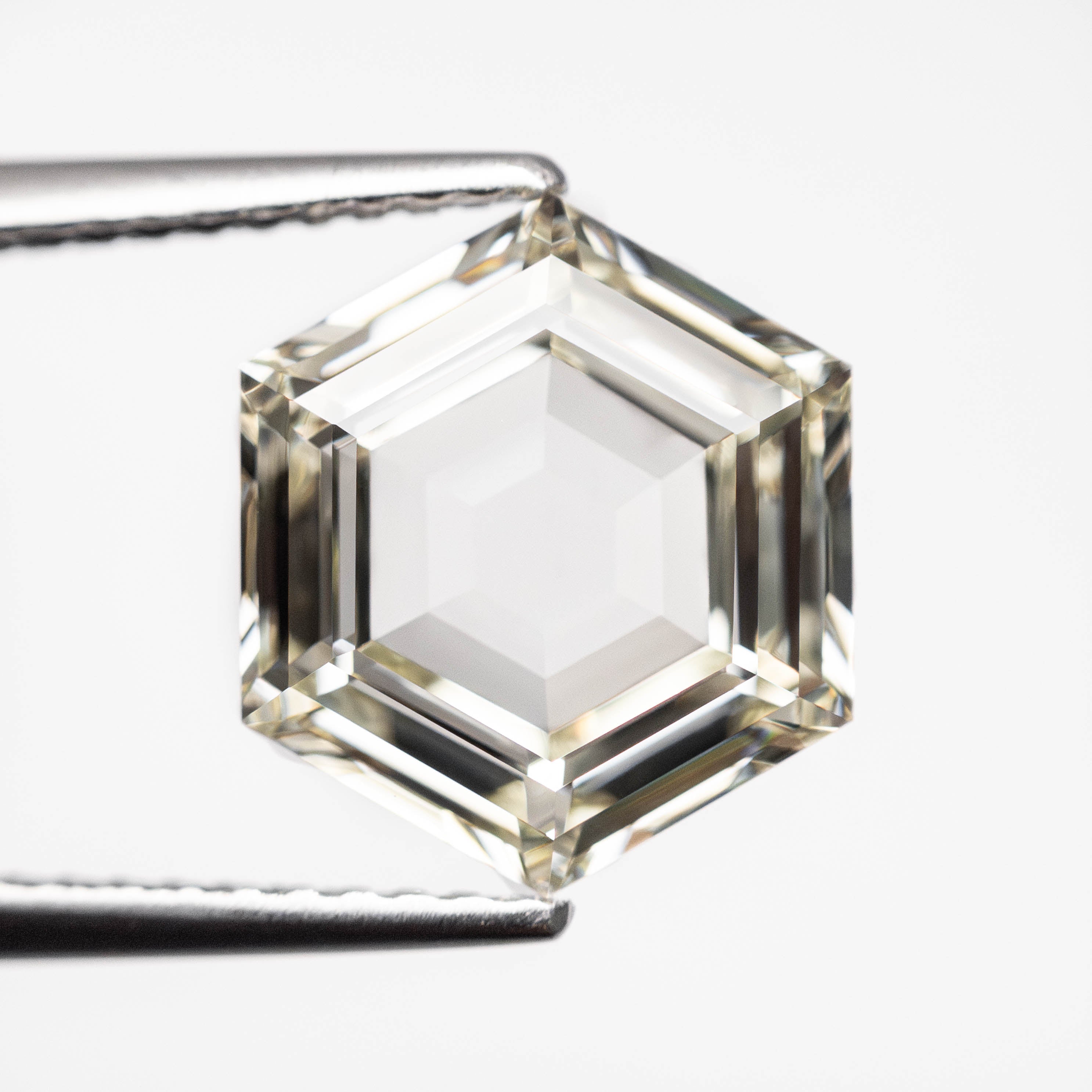 3.15ct GIA Certified M Color VVS2 Clarity Hexagon Step Cut Diamond - 10.56x9.17x3.79mm for Engagement Rings & Fine Jewelry