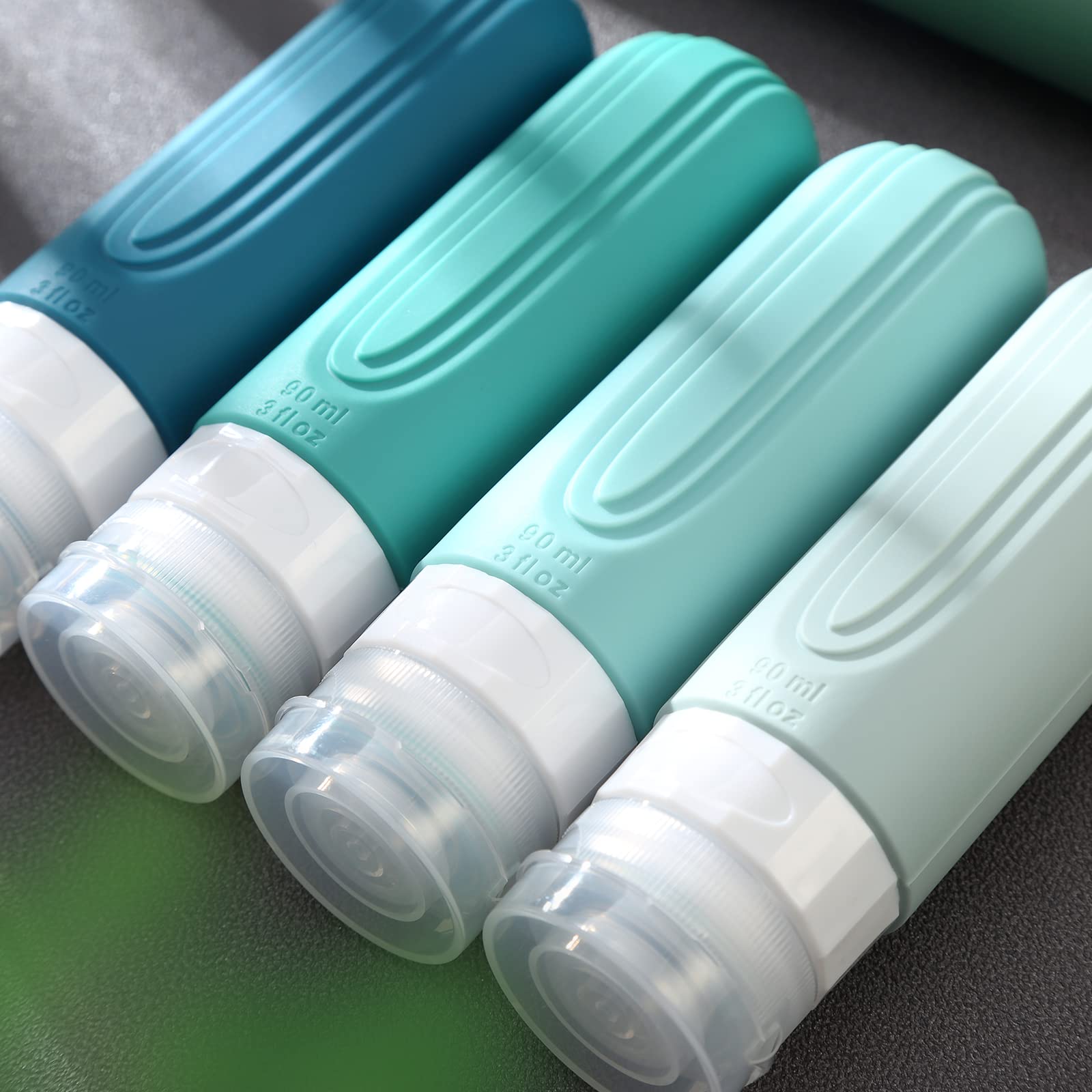 TSA Approved 3oz Travel Bottles (4 Pack) - BPA Free Leak Proof Silicone Containers for Shampoo, Conditioner & Lotion | Refillable Squeezable Toiletry Bottles for Airplane Travel, Gym & Vacation Essentials