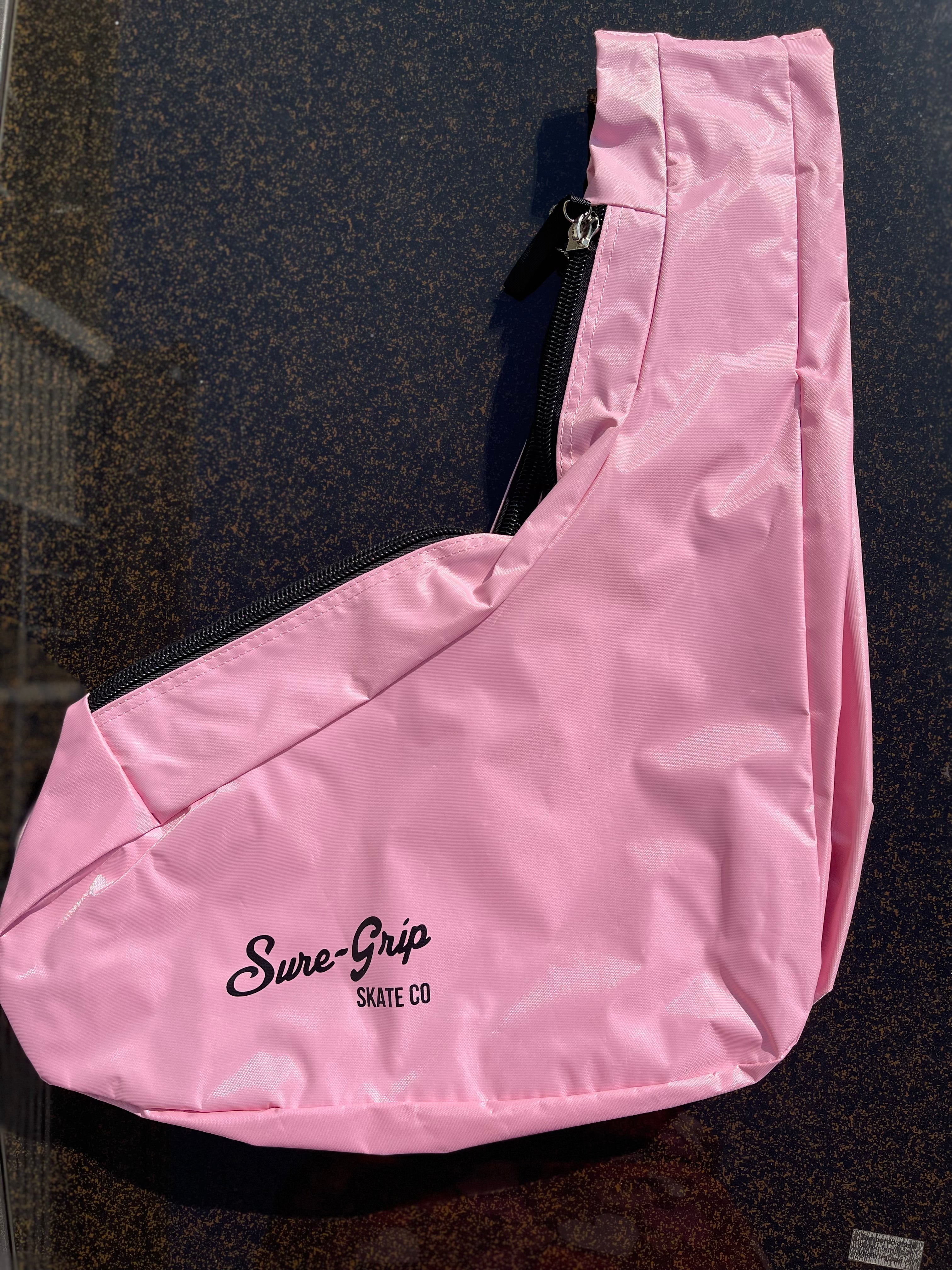 Sure Grip Sling Skate Bag - Durable & Adjustable Skateboard Backpack for Men & Women - Perfect for Skateboarding, Roller Skating & Outdoor Sports