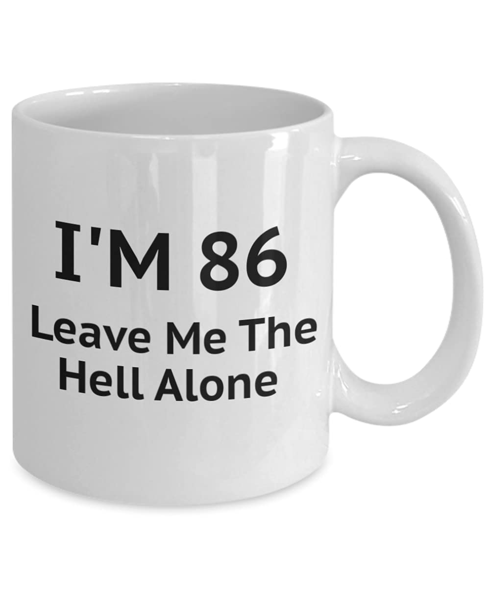 Funny 86th Birthday Coffee Mug - 11 Oz White Porcelain Mug with 'I Am 86 Leave Me The Hell Alone' Quote - Perfect Gift for Seniors & Retirement Parties