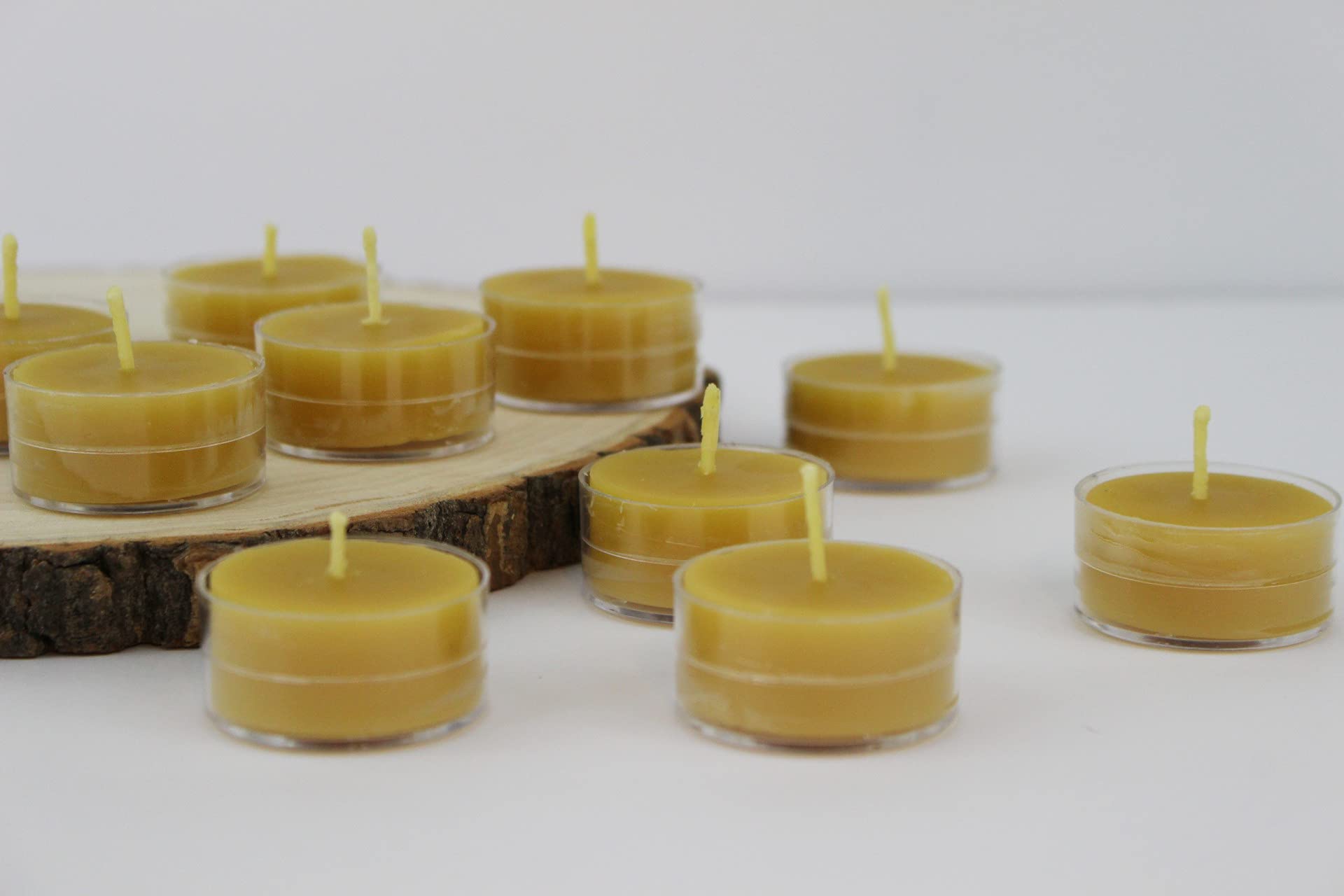 100% Pure Natural Beeswax Tealight Candles - Handmade in USA, Bulk Pack of 100 Unscented Tealights for Wedding Centerpieces, Party Decor, Romantic Dinners & Home Aromatherapy (Refill Candles Without Cups)