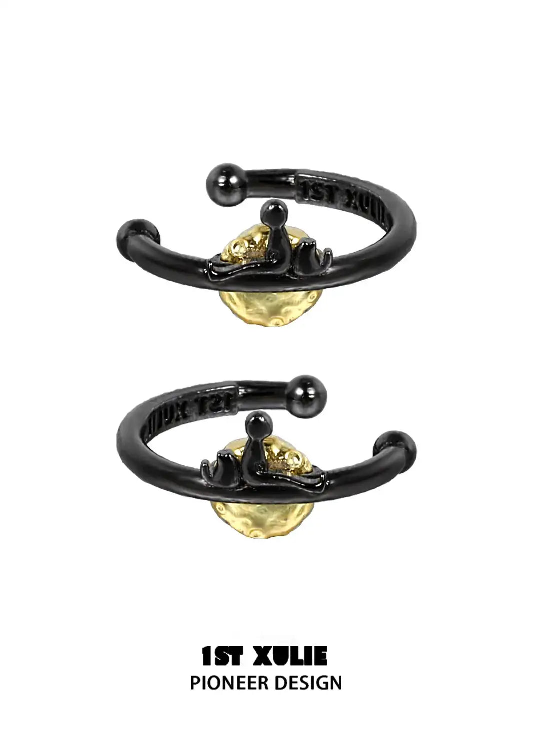 A pair of black ear clips