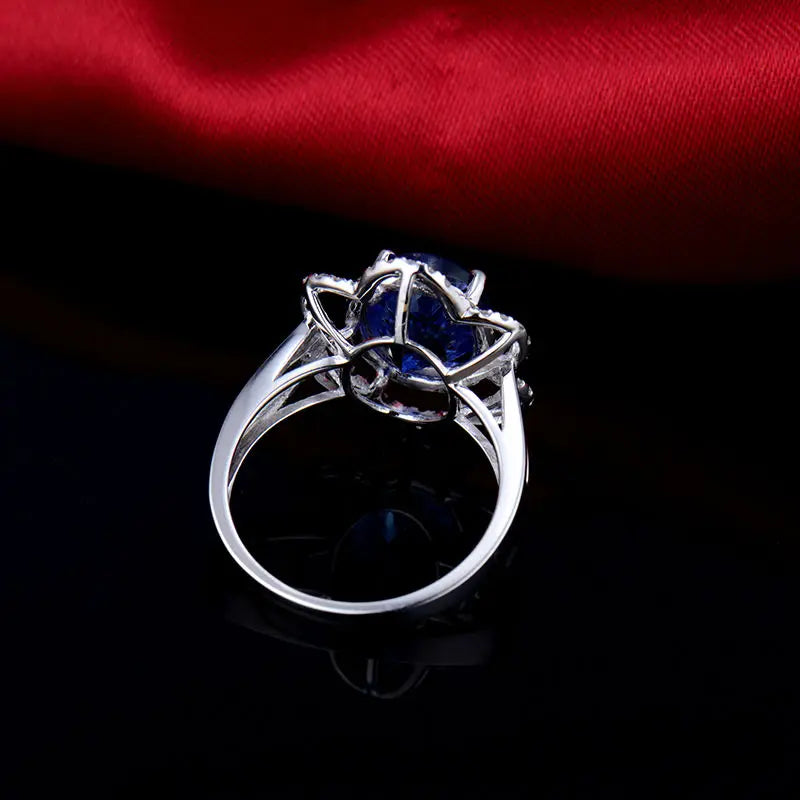 18K White Gold Blue Tanzanite Wedding Ring for Women - Princess Diana Inspired Floral Engagement Ring for Brides, Anniversaries & Special Occasions