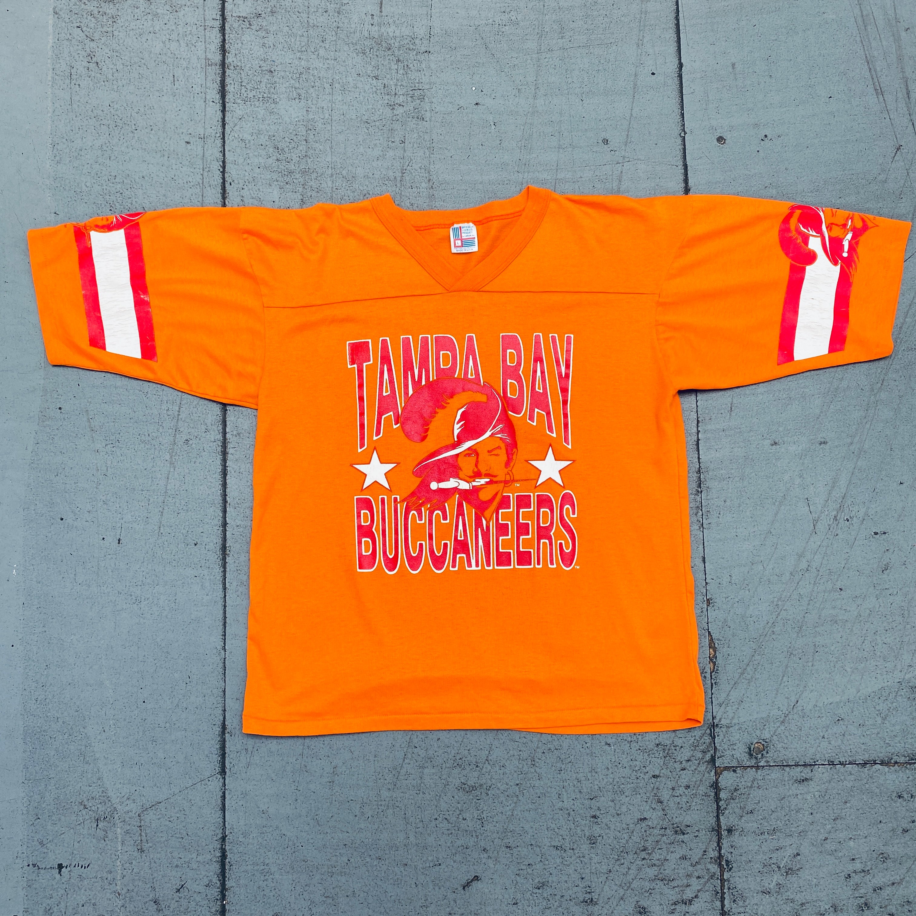 Vintage Tampa Bay Buccaneers 1980s Bucco Bruce Creamsicle T-Shirt - M/L - Retro NFL Football Fan Jersey for Men & Women - Perfect for Game Day, Throwback Parties & 80s Theme Events