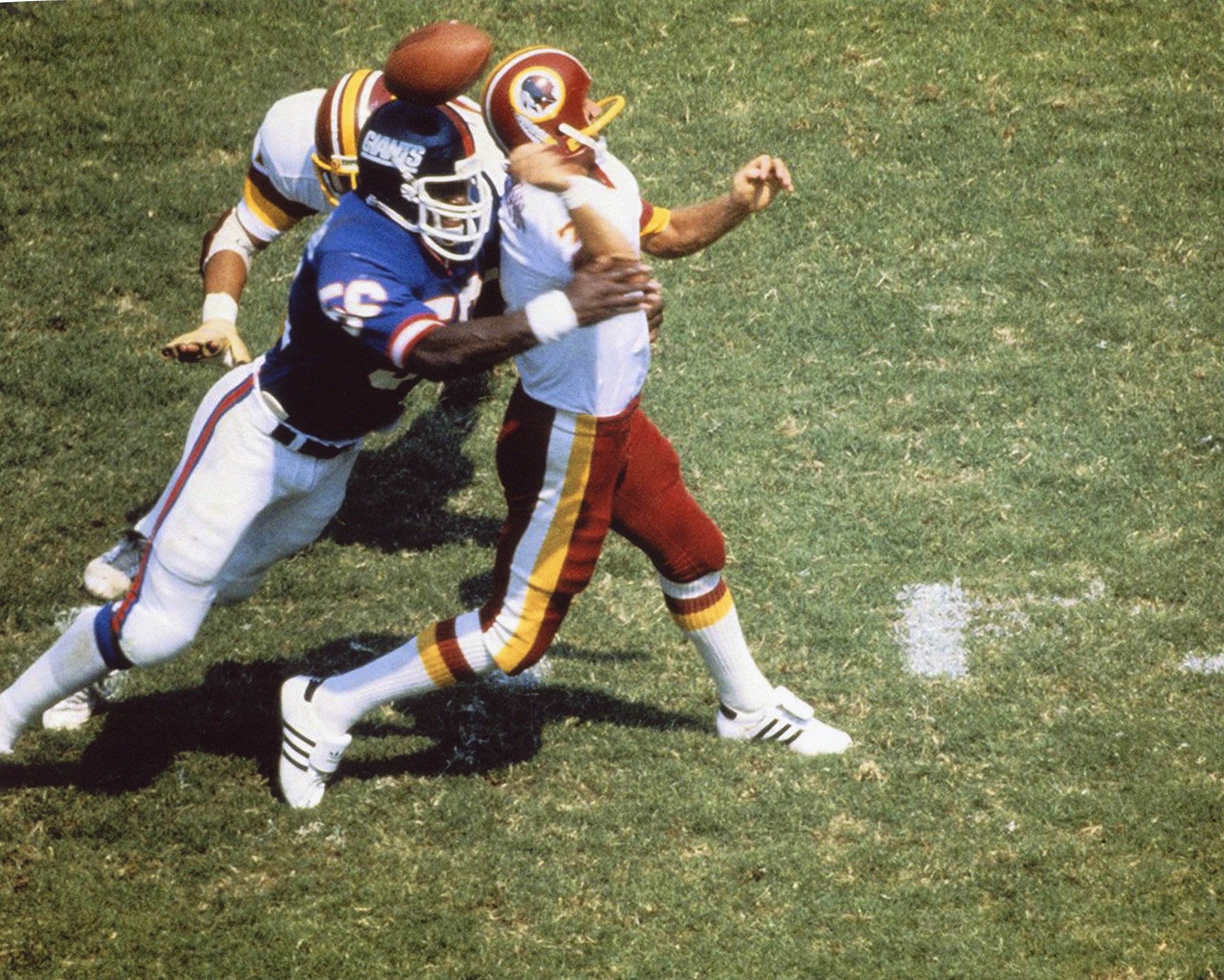 Washington Lawrence Taylor & Joe Theismann 8x10 Sports Action Photo - XL Size - Perfect for NFL Fans, Sports Memorabilia Collectors, and Home/Office Decor