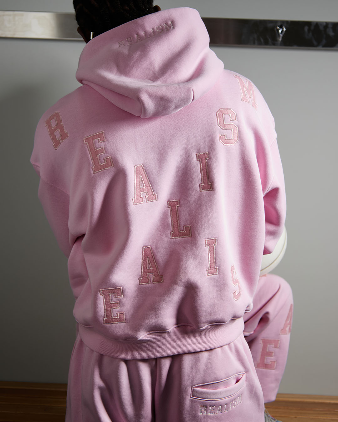 SSS Realism Grandstand Hoodie in Baby Pink - Soft & Stylish Pullover for Women & Men - Perfect for Casual Wear, Gym, and Street Fashion