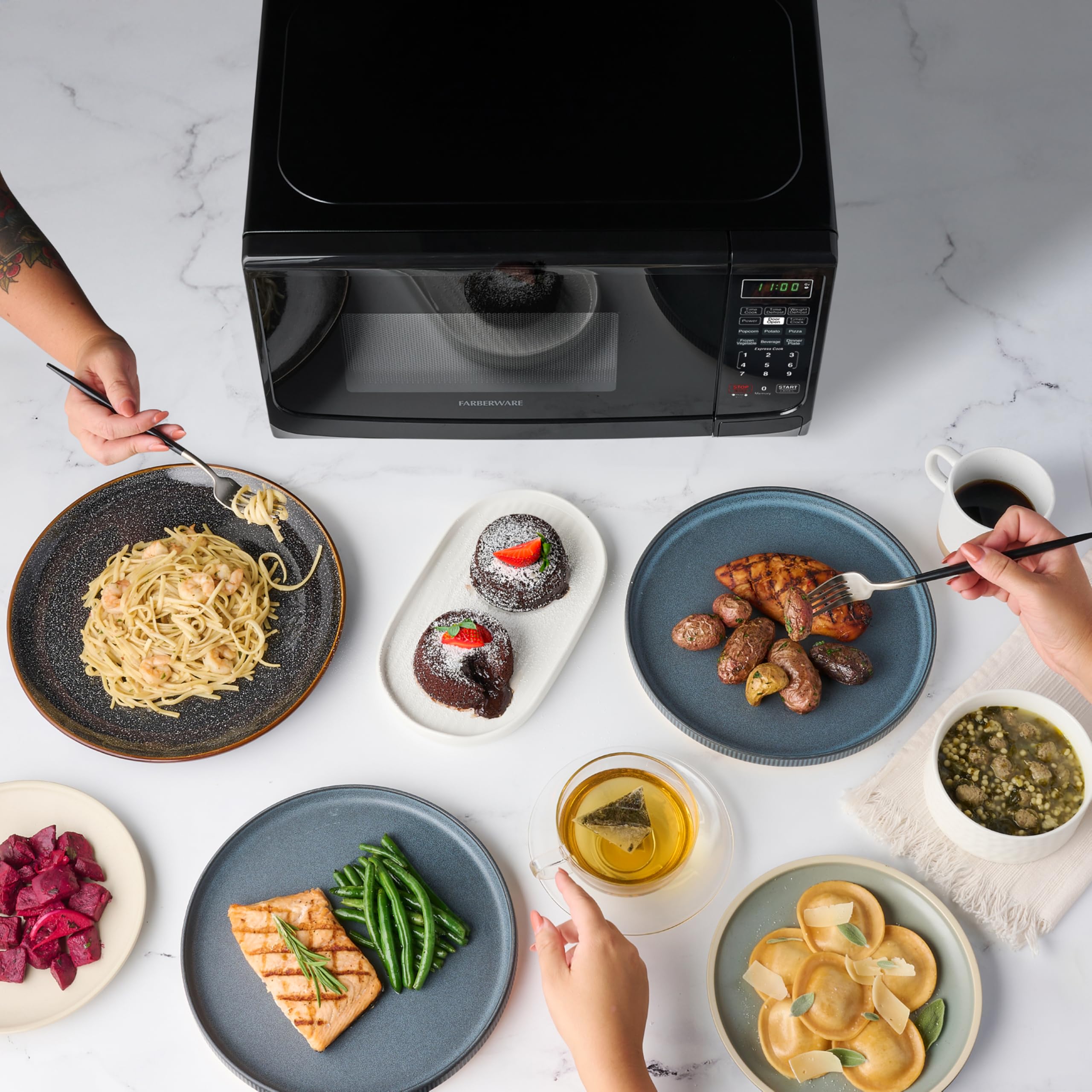 Farberware 0.7 Cu. Ft 700W Countertop Microwave Oven with LED Lighting & Child Lock - Easy Clean Grey Interior, Retro Black Design - Perfect for Small Kitchens, Apartments, Dorms & Office Break Rooms - Quick Meals, Reheating & Defrosting