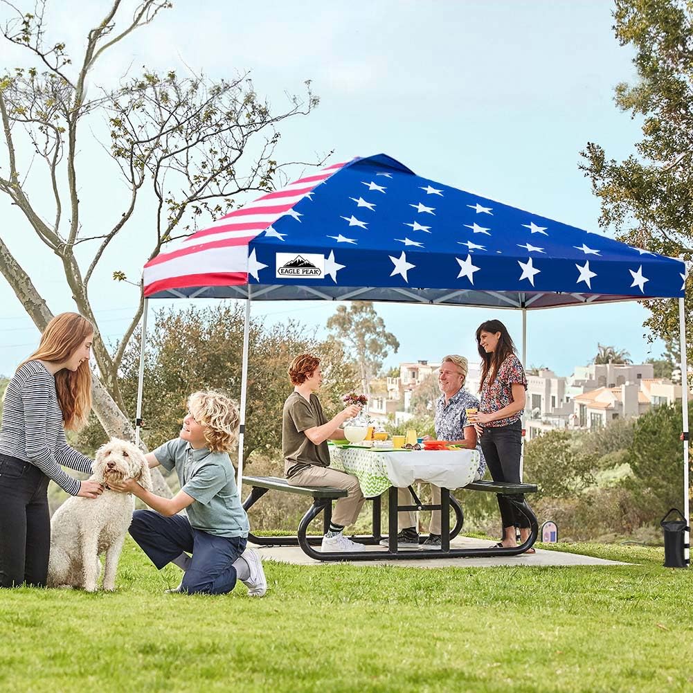 EAGLE PEAK 10x10 ft Pop Up Canopy Tent with Wheeled Carry Bag - Portable Instant Shelter with 8 Stakes, 4 Ropes & 4 Weight Bags - 100 sq ft Shade Coverage (American Flag Design) - Perfect for Backyard BBQs, Beach Outings, Camping & Outdoor Events