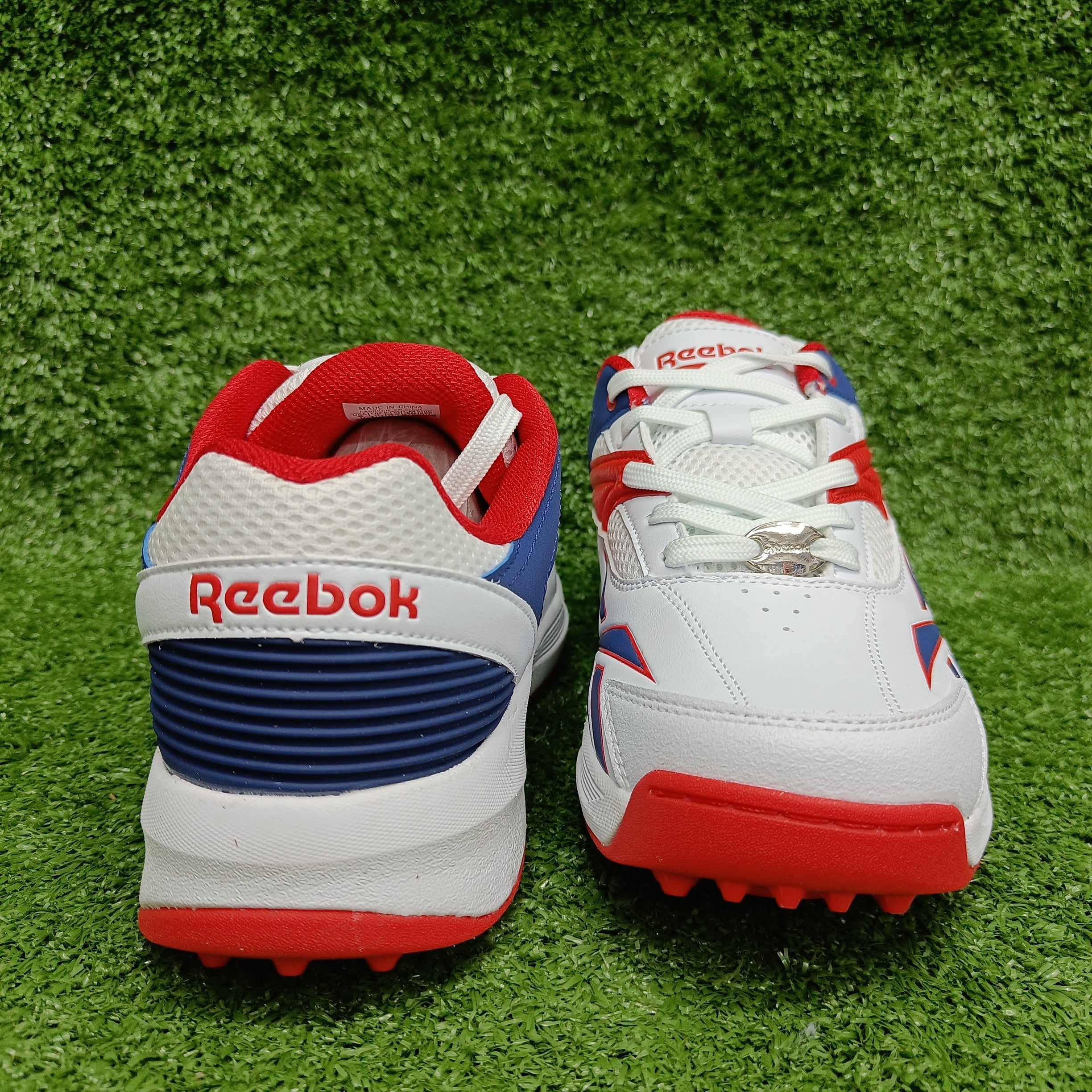 Reebok Not Out Syndicate Cricket Shoes - White/Blue/Red Metal Spike Cleats for Men | Perfect for Professional Matches & Training Sessions
