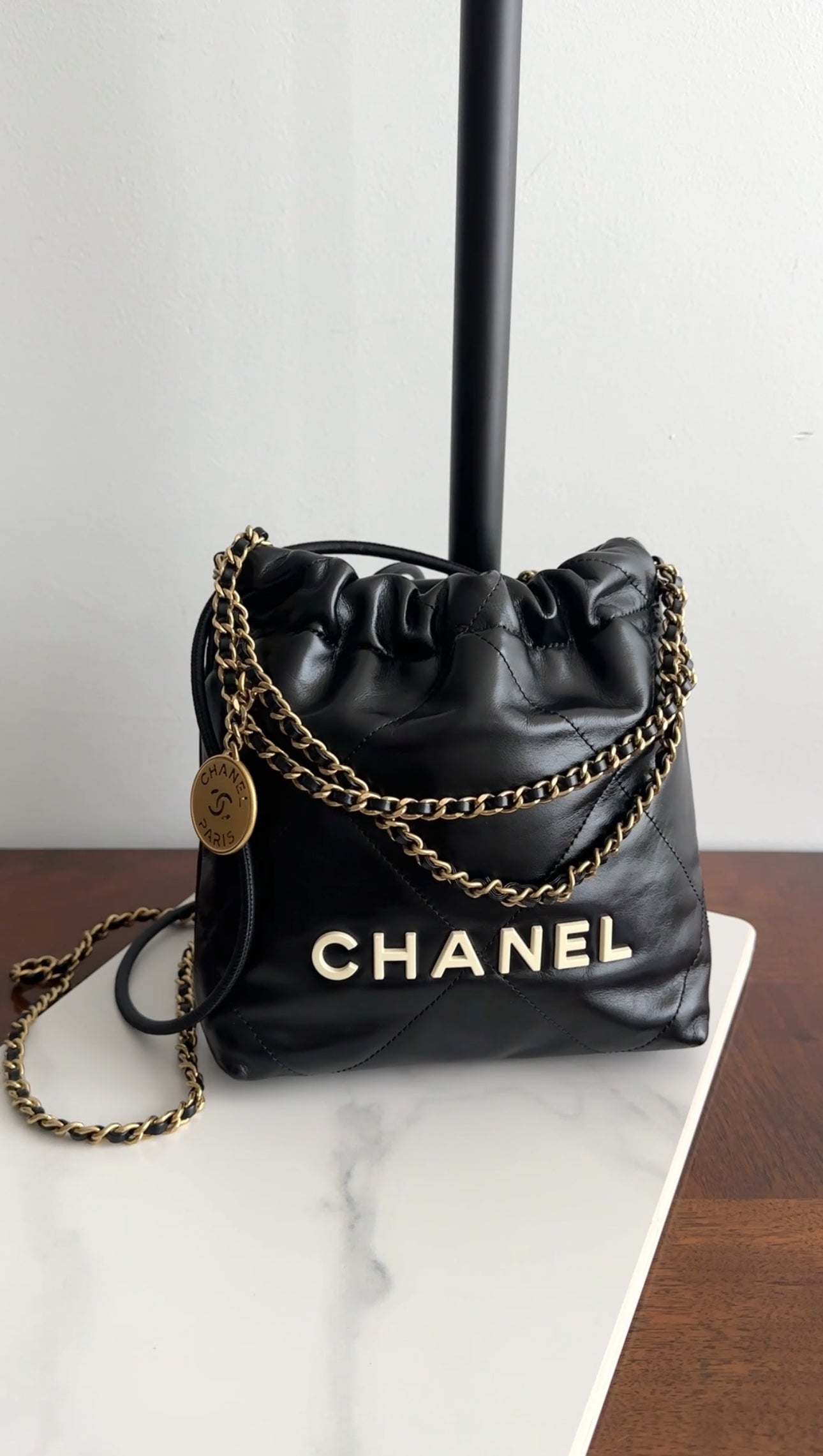 Chanel 2023 Black Leather Chain 22 Mini Bag with Ivory Enamel Logo - Luxury Designer Handbag for Women, Perfect for Evening Parties & Date Nights