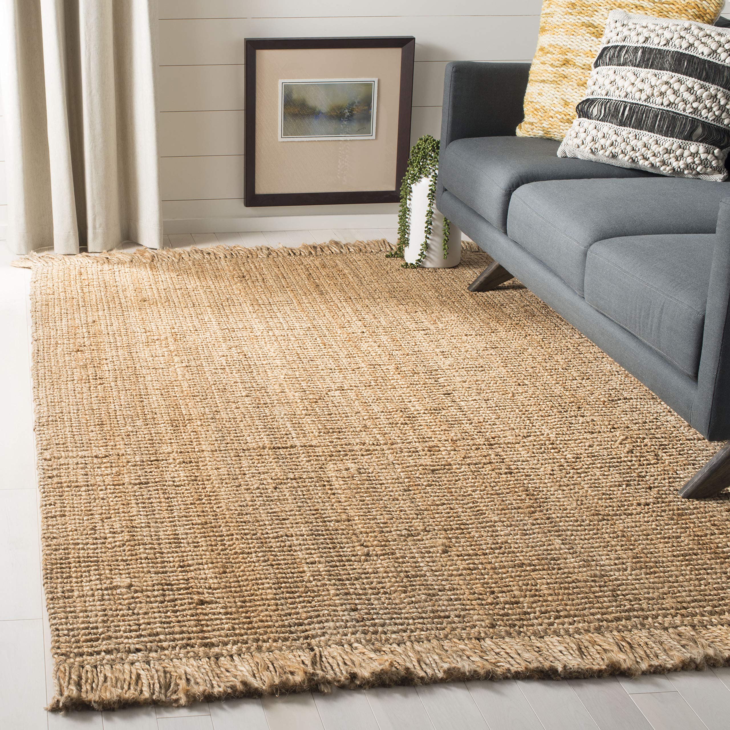 SAFAVIEH Natural Fiber Handmade Jute Area Rug 6' x 9' - Farmhouse Style with Fringe, Eco-Friendly Natural Color, Durable for High Traffic Living Room & Bedroom | Perfect for Boho Decor, Cozy Home Office & Nursery Floor Covering (NF876B)