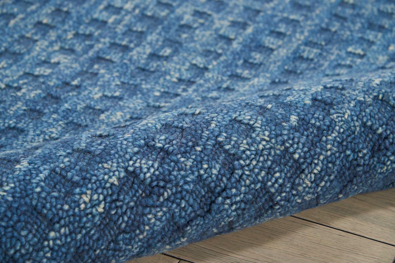 Nourison Perris Solid Navy 5' x 7'6