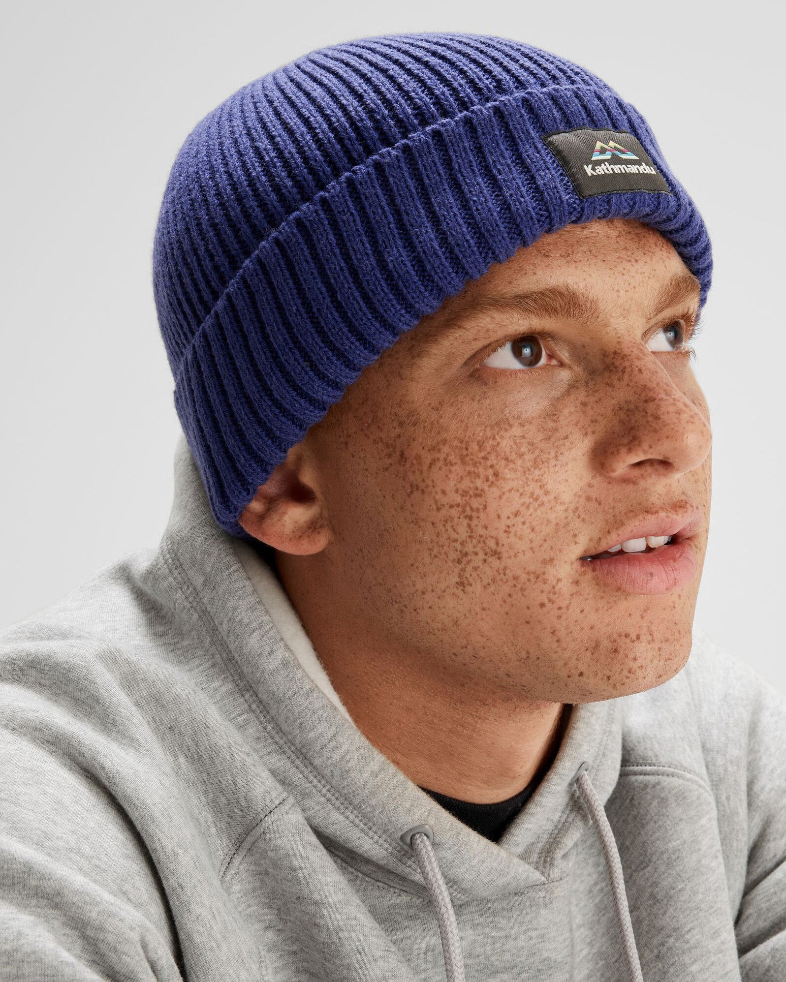 Kathmandu Horizon Line Badge Beanie - Warm Winter Knit Hat for Men & Women - Perfect for Skiing, Hiking, and Outdoor Adventures