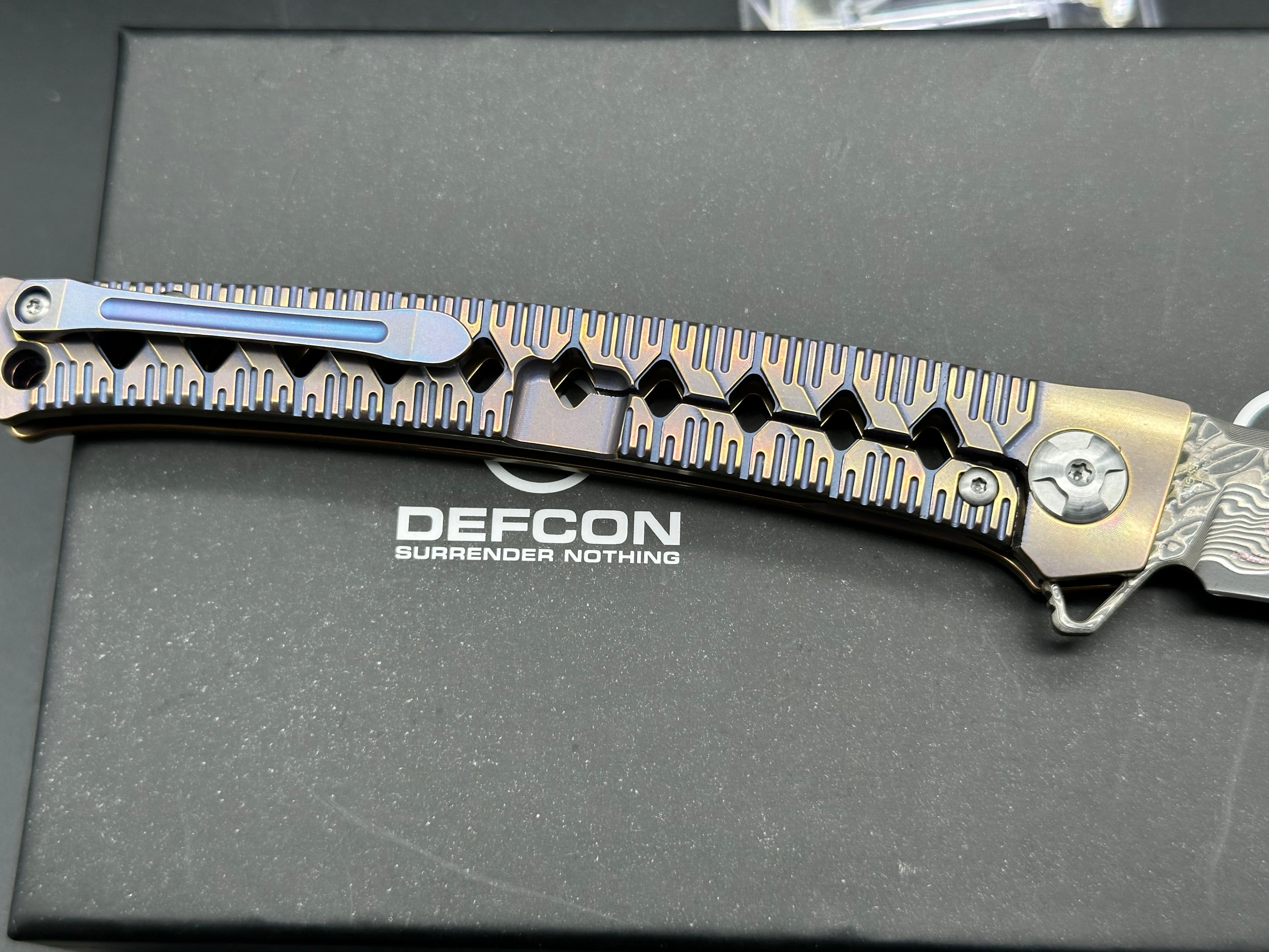 DEFCON JK Series Folding Knife - Damascus Steel Blade with Bronze Titanium Handle - EDC Pocket Knife for Camping, Hiking & Outdoor Survival