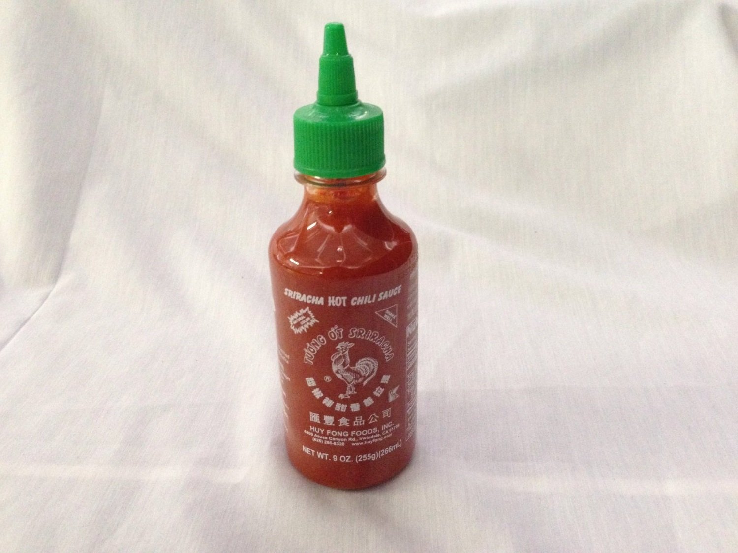 Huy Fong Sriracha Hot Chili Sauce - 9oz Bottle (Pack of 12) | Premium Asian Hot Sauce for Cooking, Pho, Ramen & Spicy Food Lovers