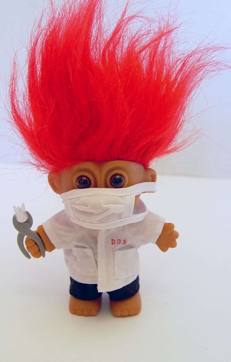 Russ Berrie 4.5 Inch Red Haired Lucky Troll Dentist Doll Holding Tooth - Cute Collectible Figurine for Dental Office Decor, Gift for Dentists & Troll Lovers