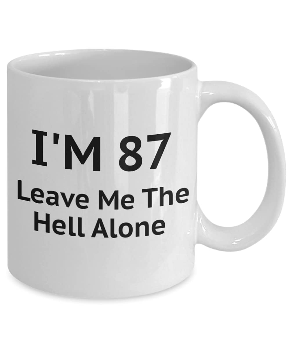 87th Birthday Coffee Mug - Funny 'I Am 87 Leave Me The Hell Alone' Quote - 11 Oz White Porcelain Cup - Perfect Gift for Senior Citizens & Retirement Celebrations