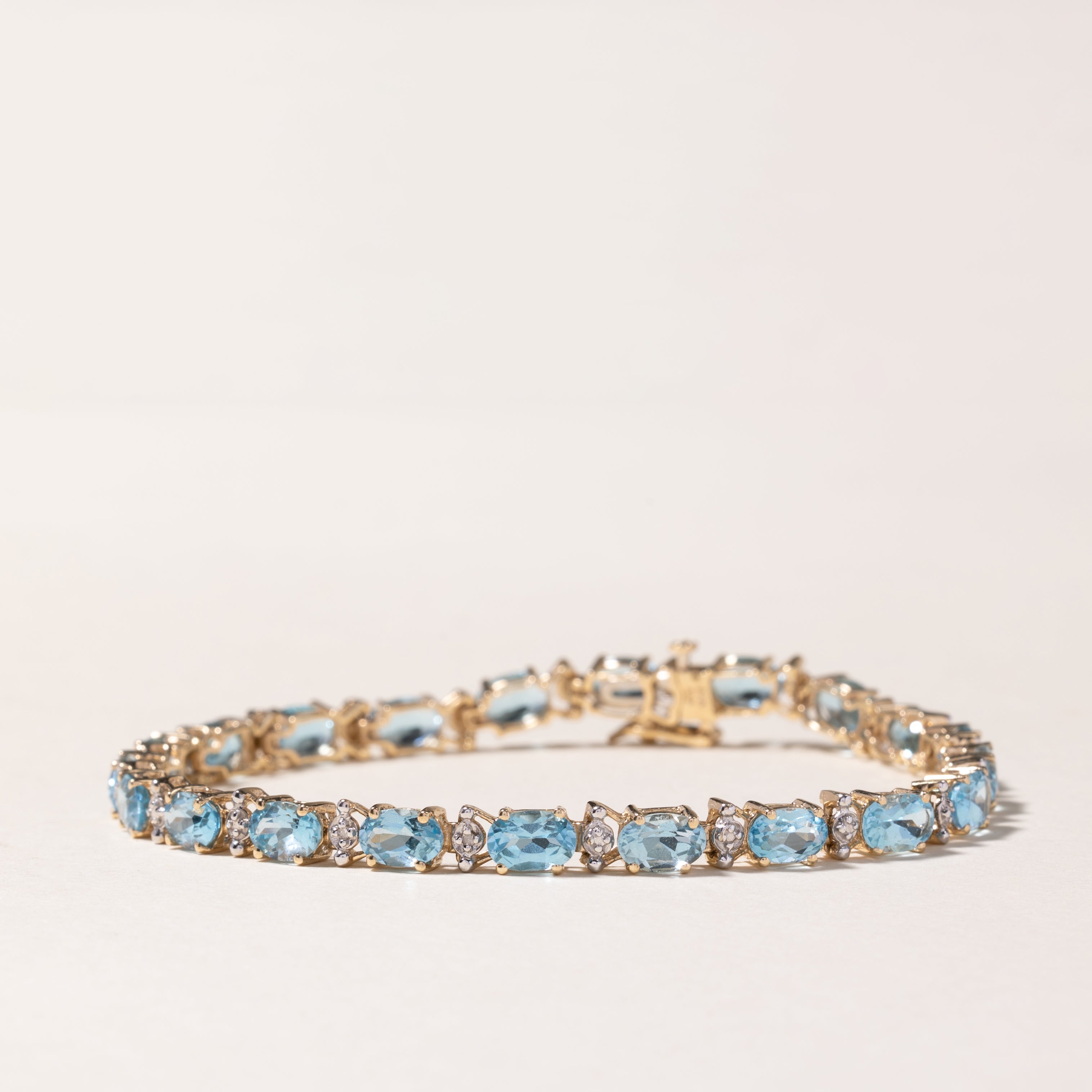 10K Yellow Gold Blue Topaz Bracelet - 10.29ctw Gemstone Jewelry with 0.01ctw Diamonds | 7.25