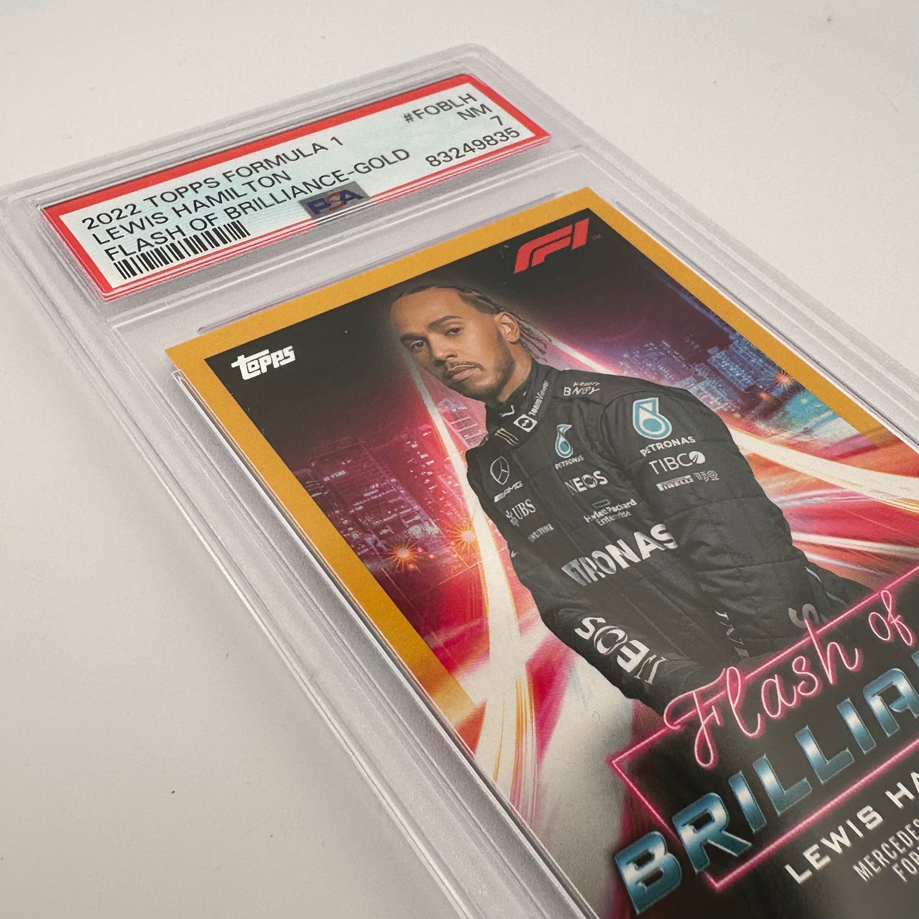 PSA 7 Graded 50/50 Lewis Hamilton #FOBLH Flash Of Brilliance Gold Trading Card - Perfect for Collectors, Sports Memorabilia Displays & F1 Racing Fans