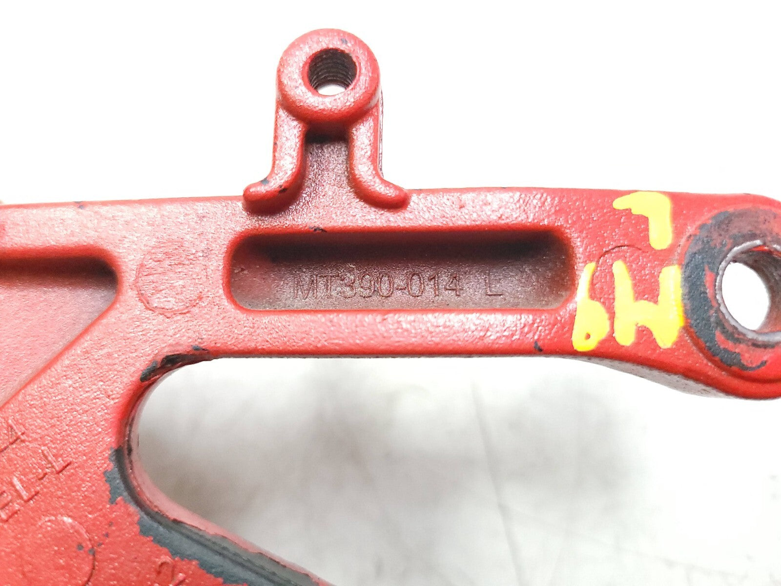 04-05 Honda CBR1000RR Foot Peg Bracket Left Side OEM Replacement Part - Perfect for Motorcycle Repair & Racing Upgrades