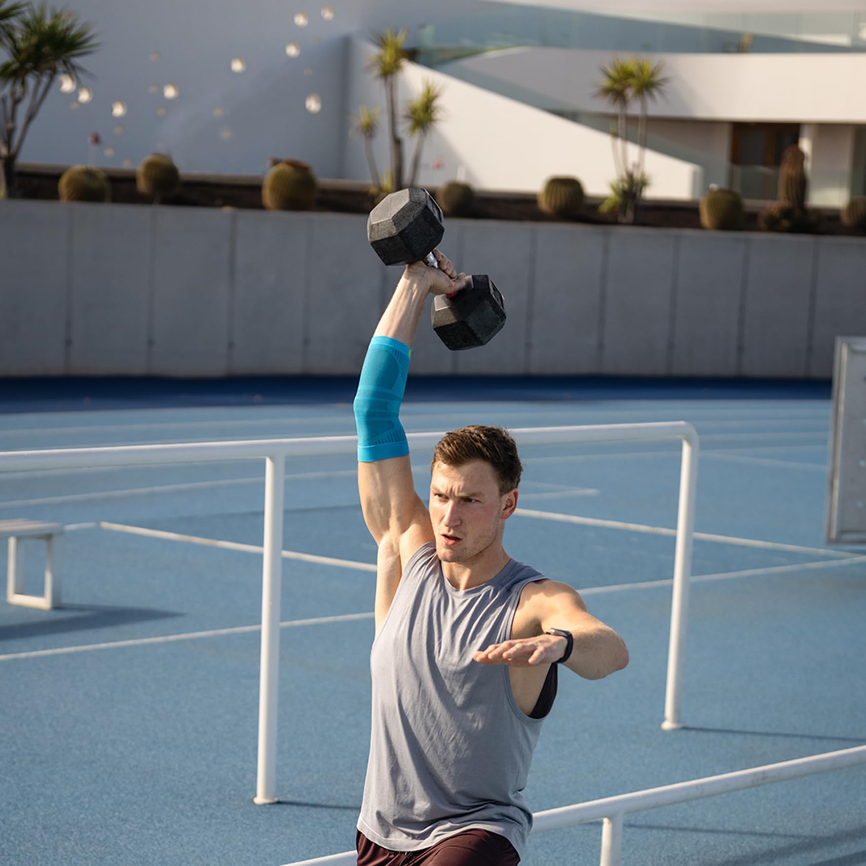 Bauerfeind Sports Compression Elbow Sleeve - Unisex Support for Tennis, Golf, Weightlifting & Impact Sports - Left/Right Arm Fit - Medium Size Rivera Blue - Ideal for Recovery & Joint Pain Relief