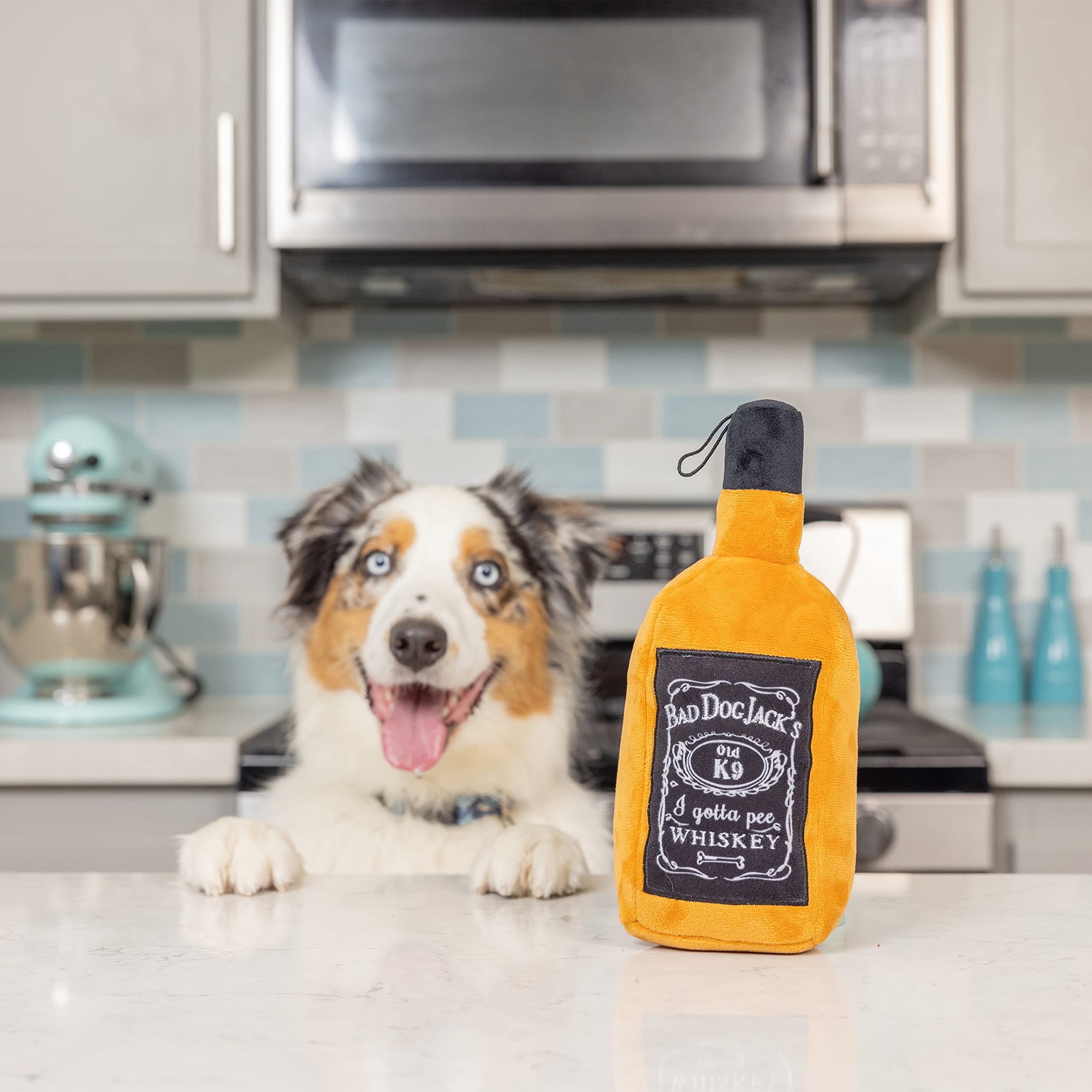 Huxley & Kent Whiskey Plush Dog Toy with Squeaker - Funny Small Dog Chew Toy for Aggressive Chewers | Durable & Safe Pet Gift for Puppies & Adult Dogs | Perfect for Playtime, Training Rewards & Birthday Presents