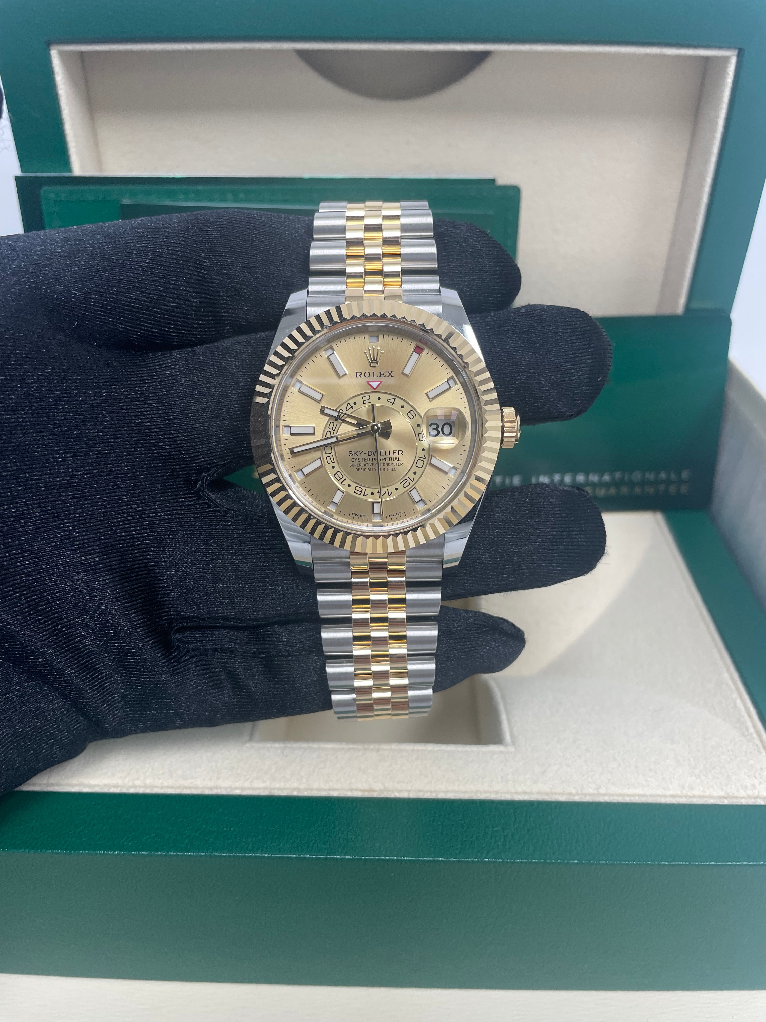 Rolex Sky-Dweller Two-Tone Stainless Steel & Yellow Gold Watch with Champagne Index Dial and Jubilee Bracelet (Ref# 326933) - Luxury Timepiece for Business Travelers and Watch Collectors
