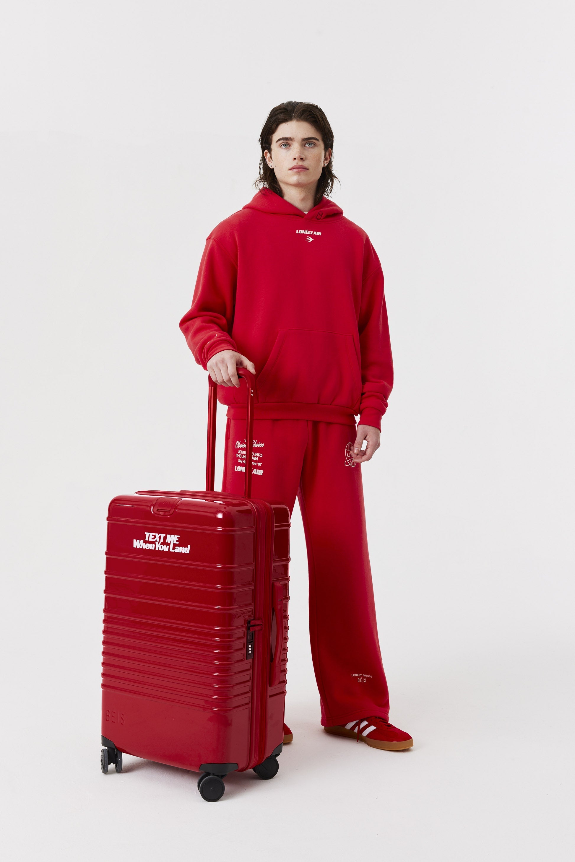 Textured Red Medium Check-In Roller Luggage - Perfect for Air Travel & Weekend Getaways