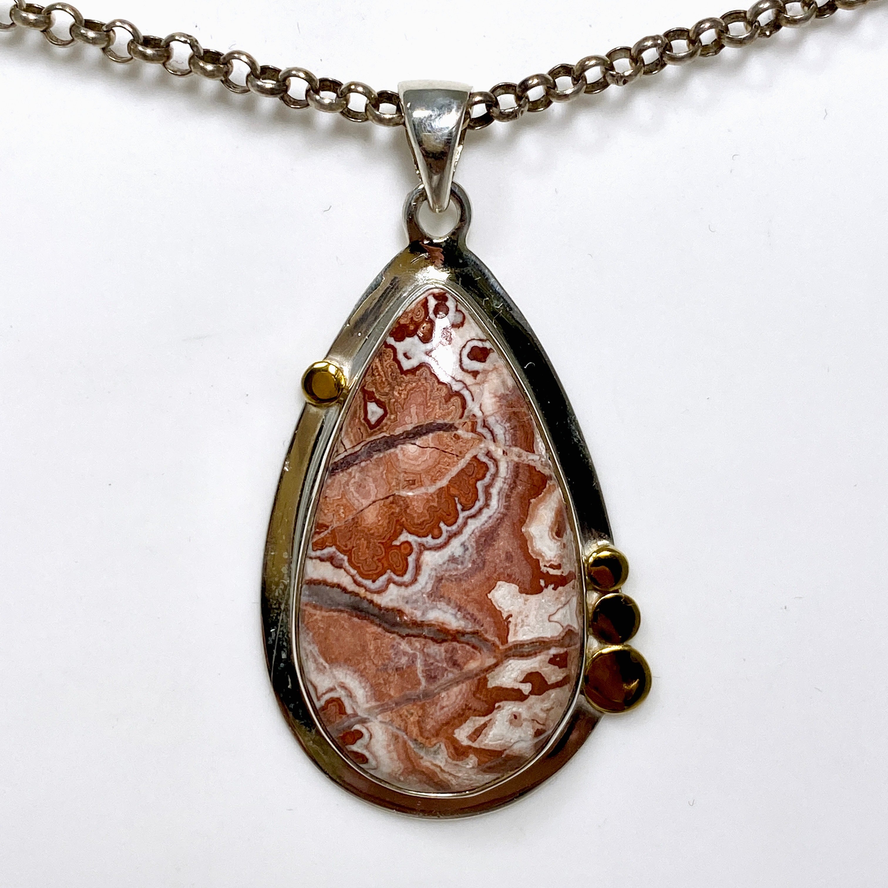 Crazy Lace Rosetta Stone Teardrop Pendant with Brass Decorative Setting KPGJ4569 - Elegant Bohemian Jewelry for Women, Perfect for Casual Wear, Date Nights & Special Occasions