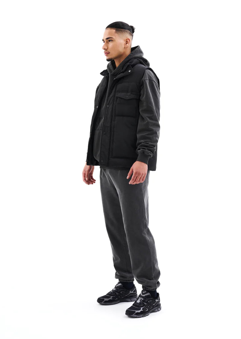 Black Cutback Vest for Men & Women - Stylish Layering Piece for Outdoor Adventures & Casual Wear