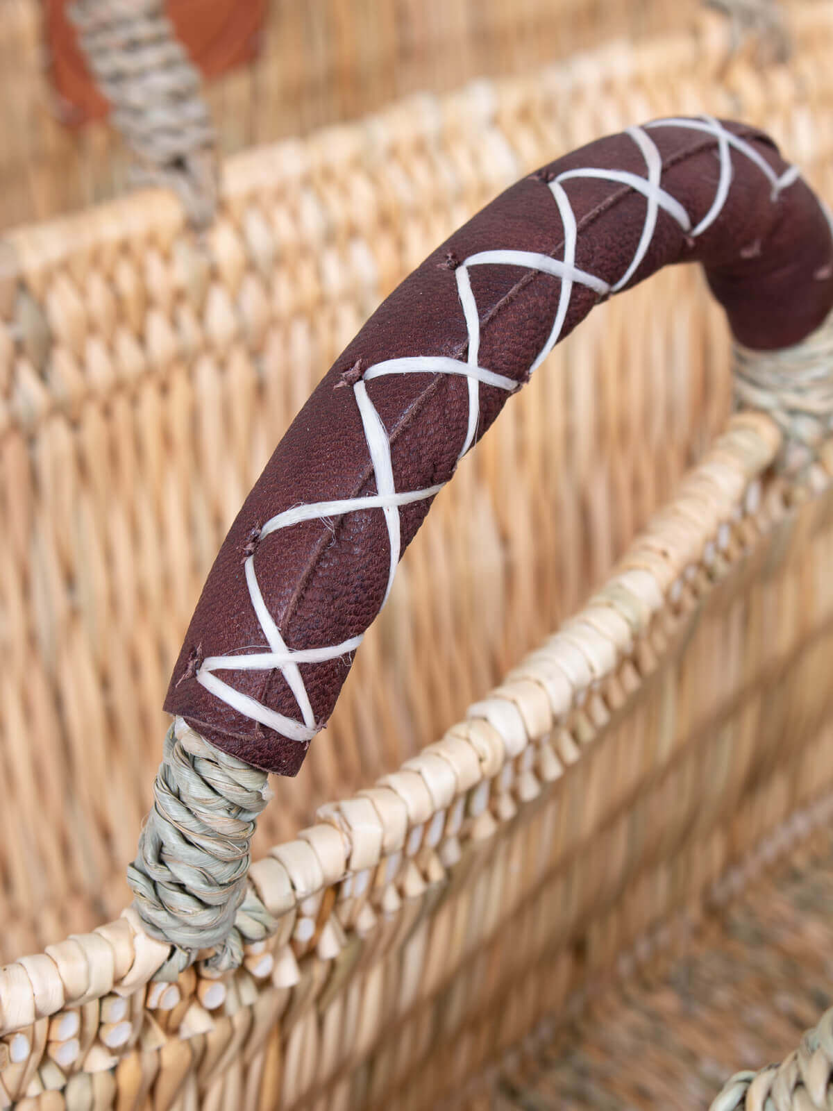 Handwoven Reed Basket with Genuine Leather Handles - Natural Woven Storage Bin for Home Decor, Laundry, or Picnic Basket - Perfect for Organizing Blankets, Toys, and More