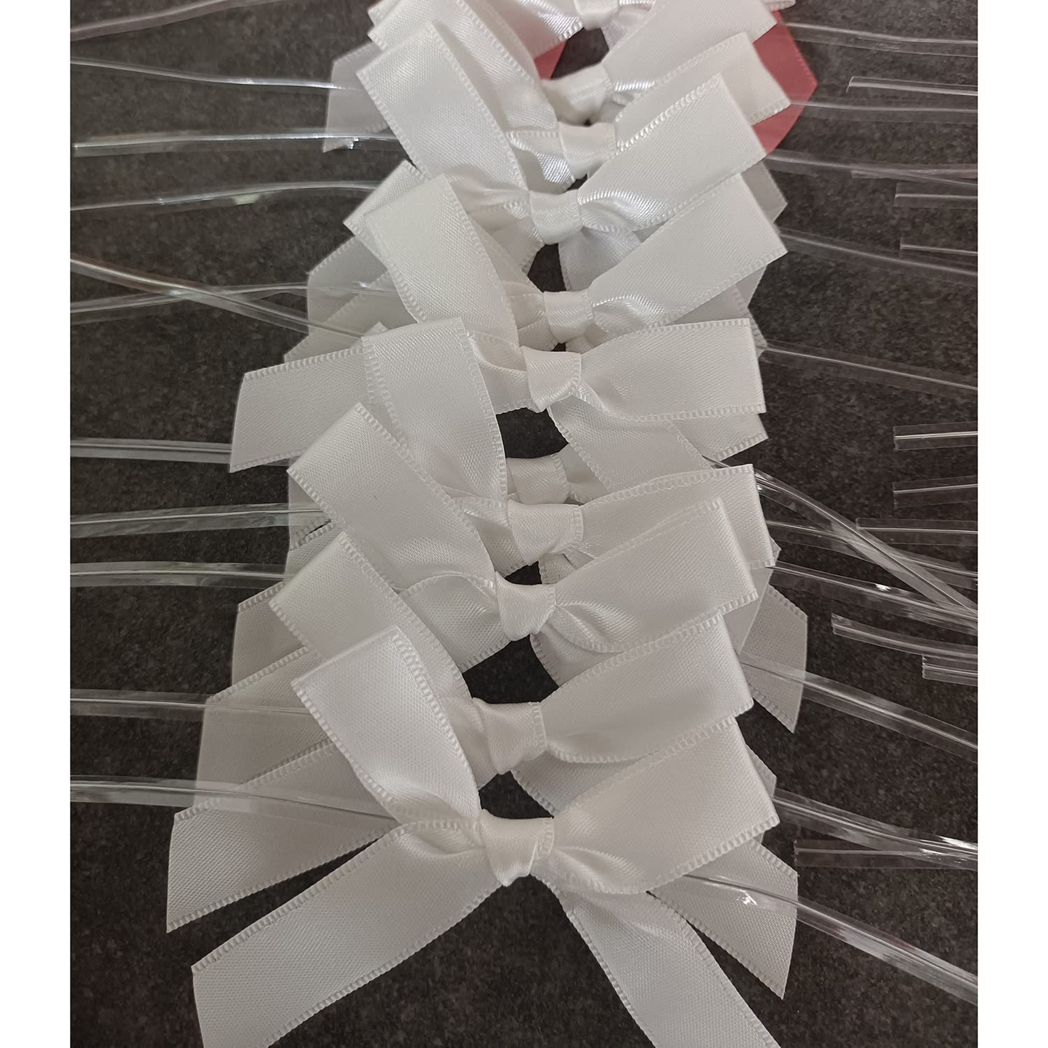 100 Pack White Pre-Tied Satin Twist Tie Bows for Christmas Treat Bags, Candy & Apple Packaging, DIY Decorations - Perfect for Holiday Gifts, Party Favors & Craft Projects