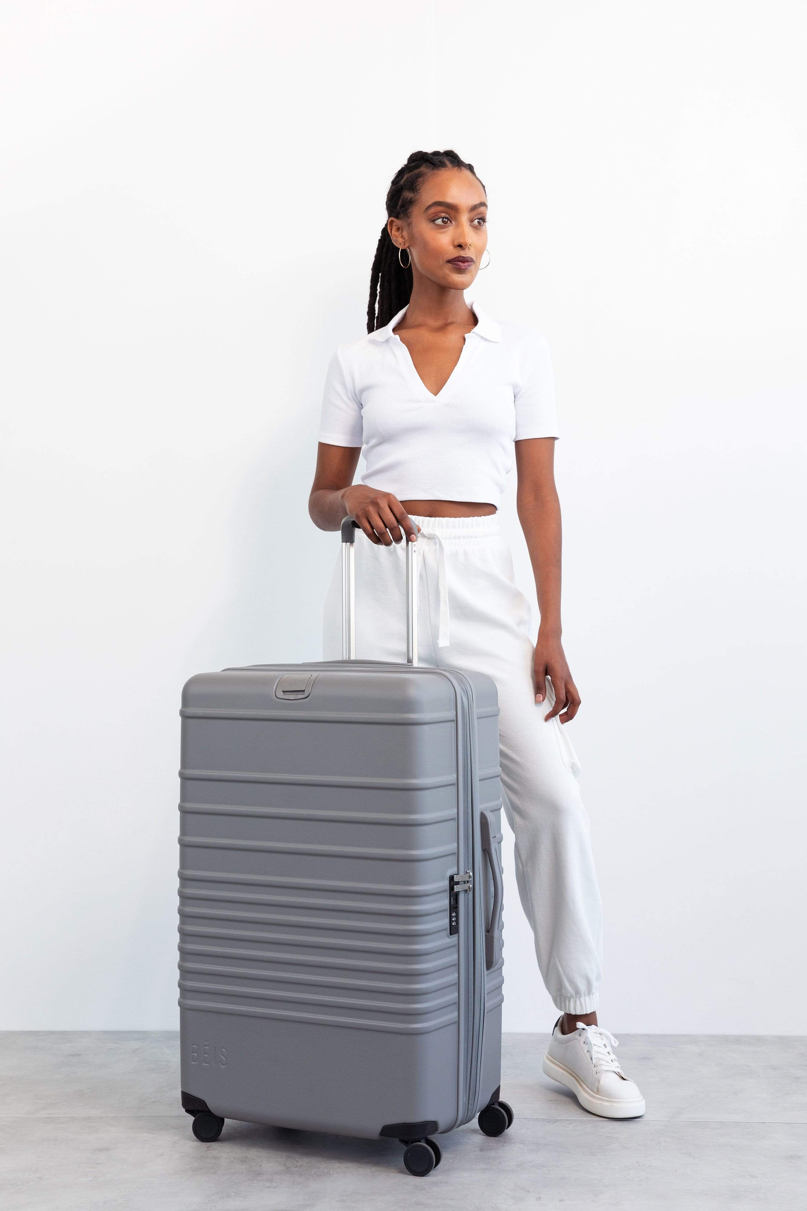 Large Grey Check-In Roller Luggage - Spacious & Durable Suitcase for Air Travel, Business Trips & Vacation Packing