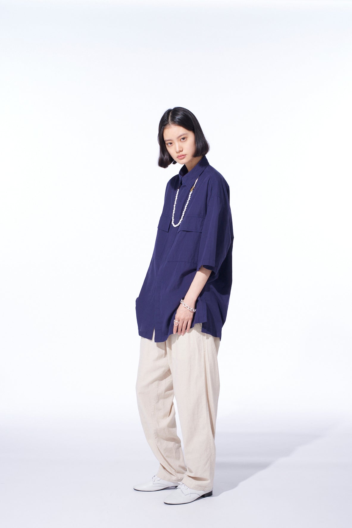 Stylish Oversized Short Sleeve Chambray Shirt with Flap Pockets - Casual Summer Wear for Women & Men | Perfect for Beach Outings, Picnics, and Weekend Getaways