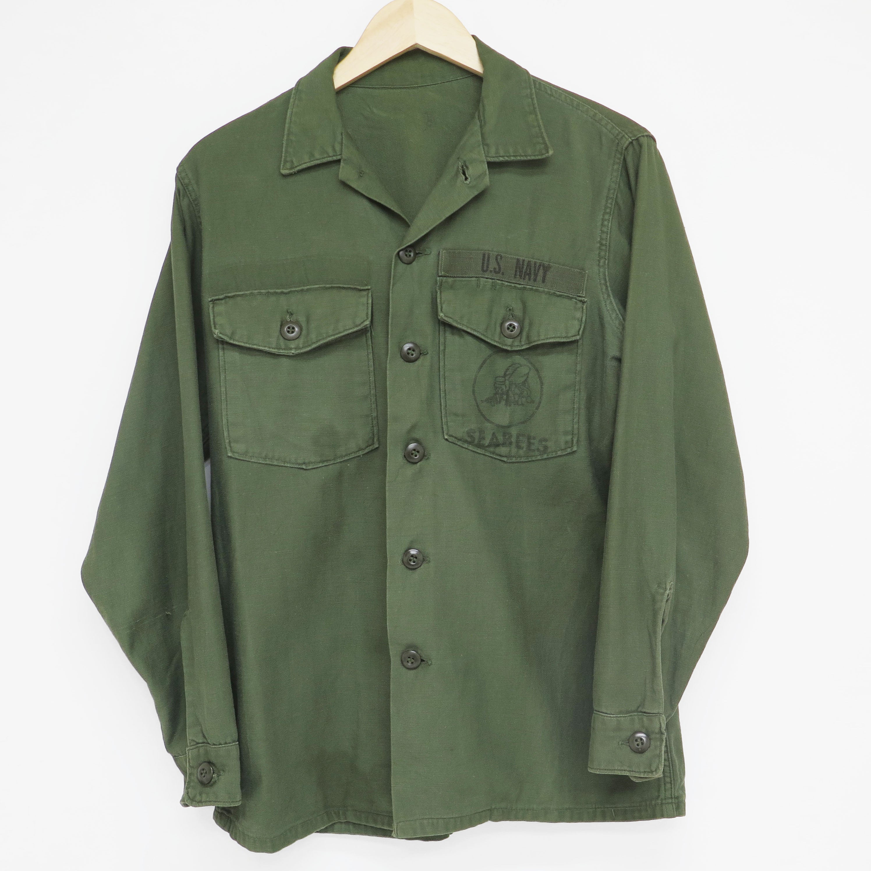 Vintage US Navy Utility Shirt P64 - Authentic 1970s Vietnam War Era Military Top with Seabees Stamp for Collectors & Reenactments