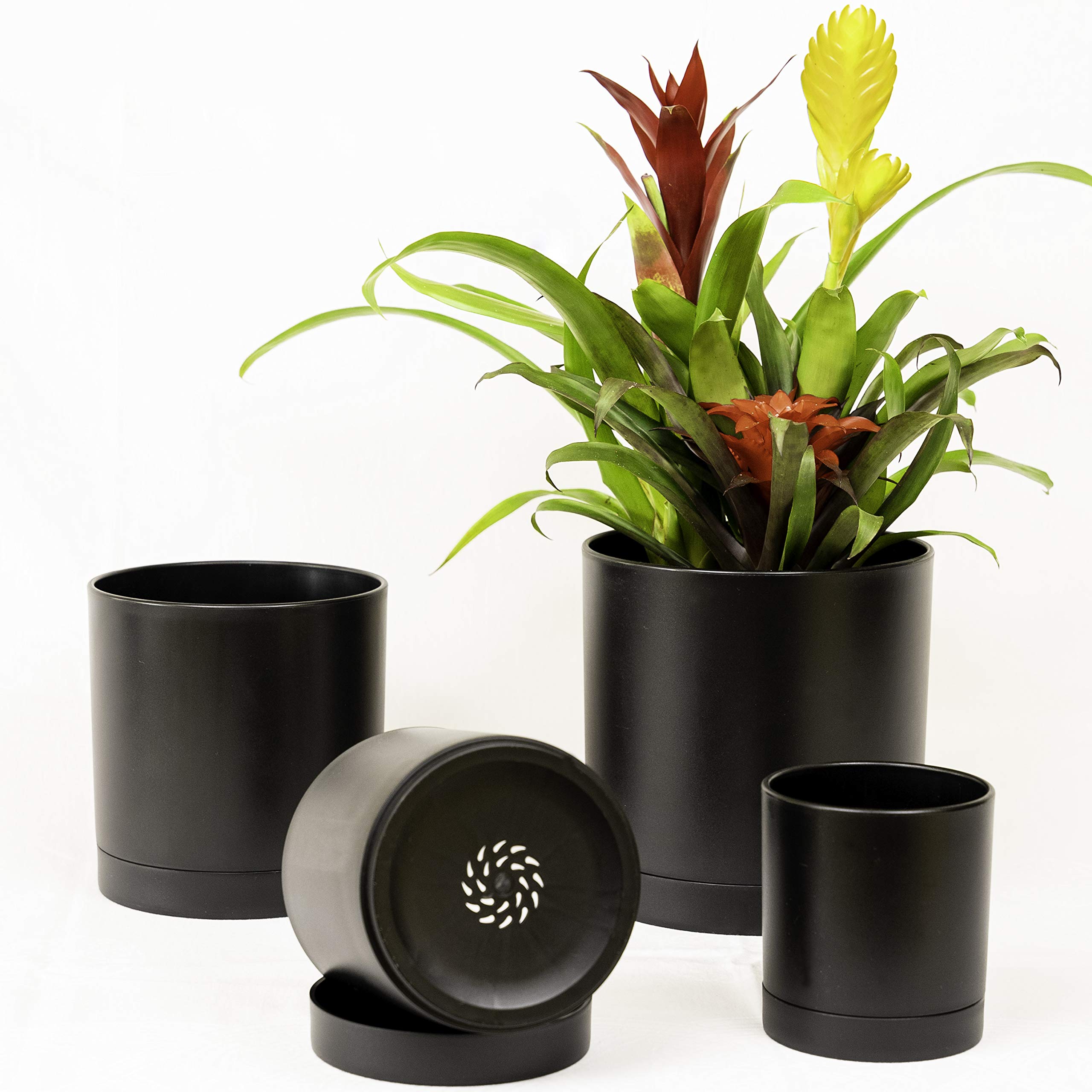 SIEGMUNT 4-Pack Plastic Plant Pots with Drainage Holes & Saucers - Modern Minimalist Flower Pots for Indoor Outdoor Plants (Matte Black) - Perfect for Home Decor, Office Desk, Garden & Patio