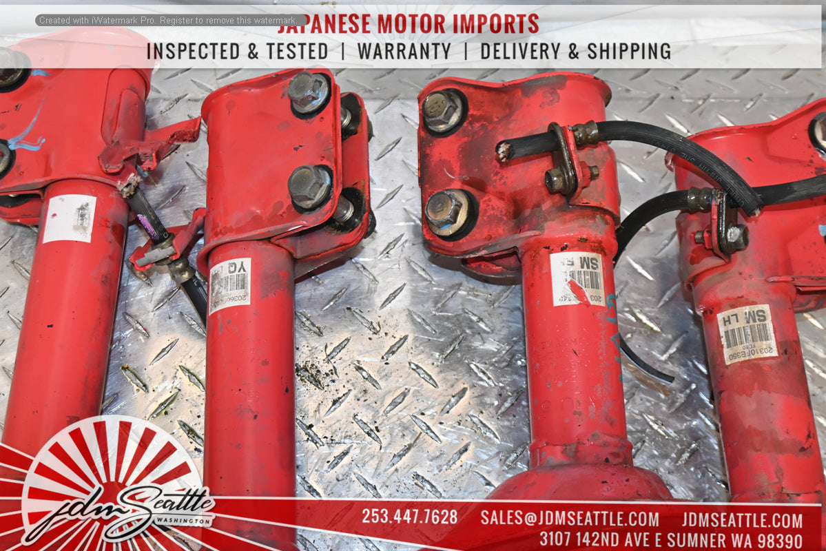 JDM 02-05 Subaru WRX STi OEM Performance Struts with Red & Black Springs - Perfect for Track Racing & Street Performance Upgrades
