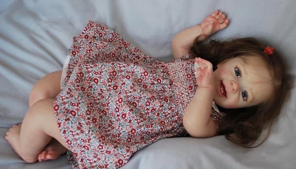 Anano 24 Inch Lifelike Reborn Baby Doll - Realistic Silicone Toddler Doll with Vivid Veins, Wrinkles & Rooted Long Hair | Includes 2 Baby Teeth & Lovely Daisy Outfit | Perfect for Collectors, Gift Giving & Role Play Scenarios