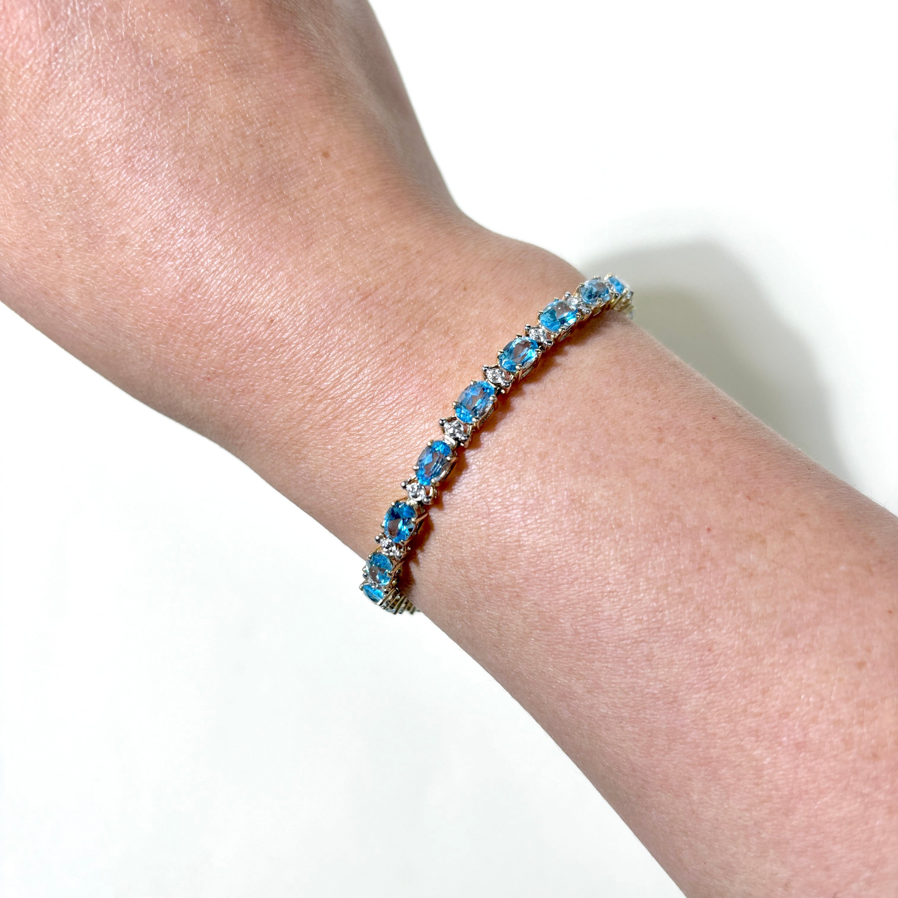10K Yellow Gold Blue Topaz Tennis Bracelet - 7.25