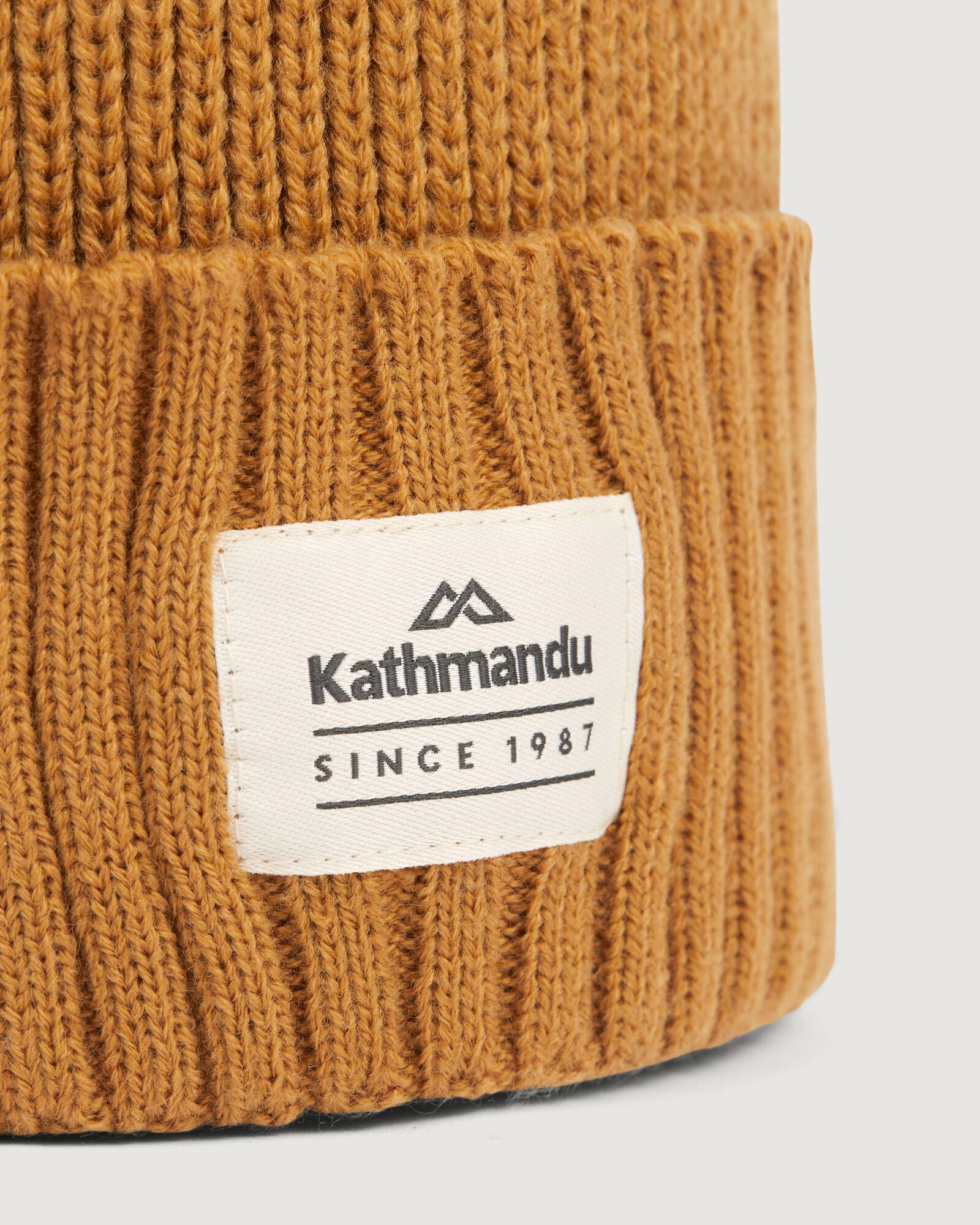 Kathmandu Badge Beanie - Golden Oak Winter Hat for Men & Women - Warm Knit Beanie for Outdoor Activities, Hiking, and Cold Weather Fashion
