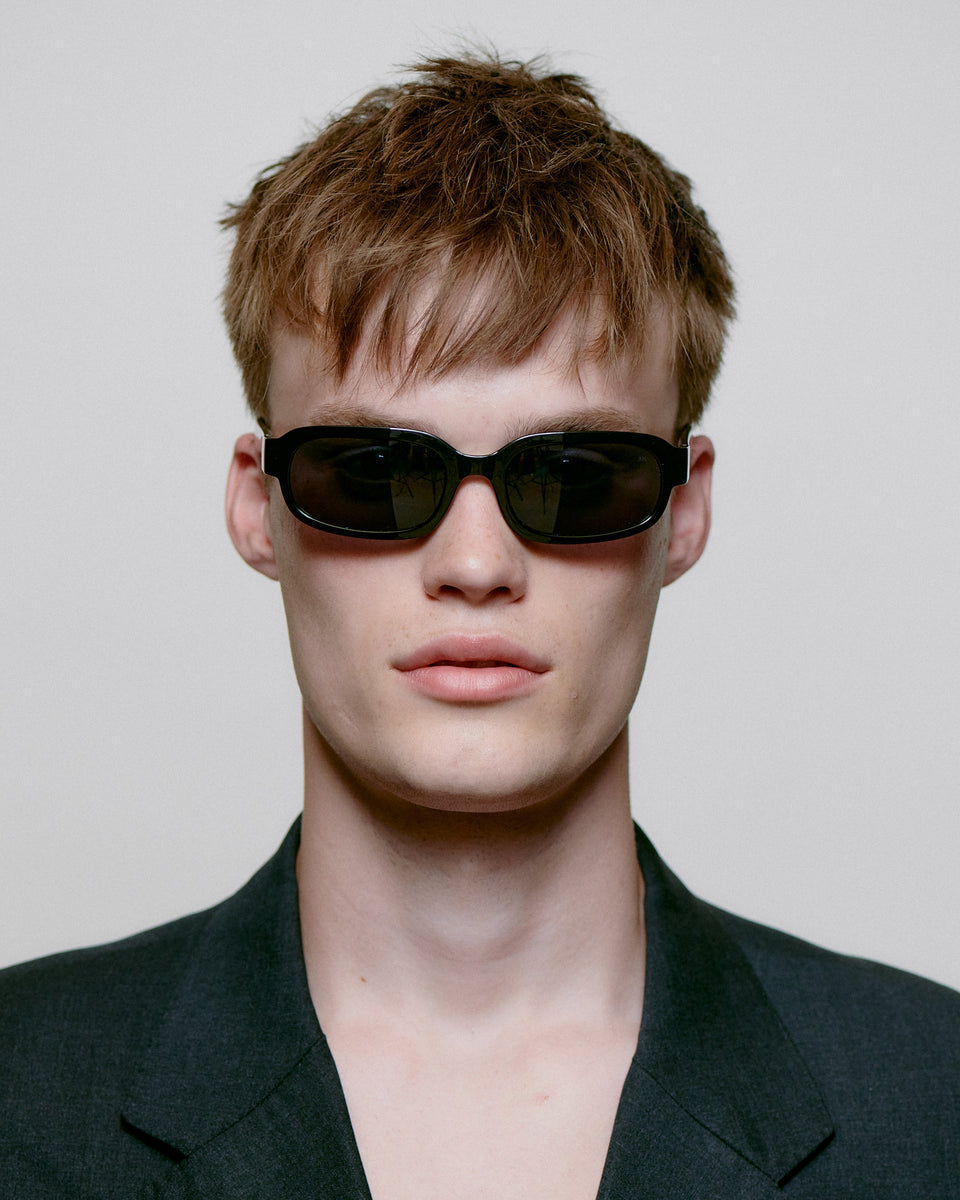 A. Kjaerbede Black Sunglasses for Men & Women - Stylish UV Protection Shades for Outdoor Activities, Driving, and Beach Vacations