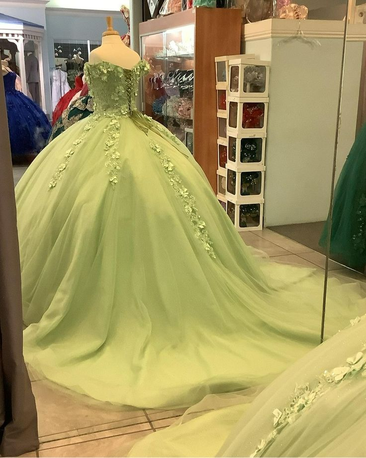 Elegant Off-The-Shoulder Sage Green Quinceañera Dress with Floral Details - Sweet 16 Ball Gown J4634 | Perfect for Quinceañeras, Debutante Balls, Prom & Formal Occasions